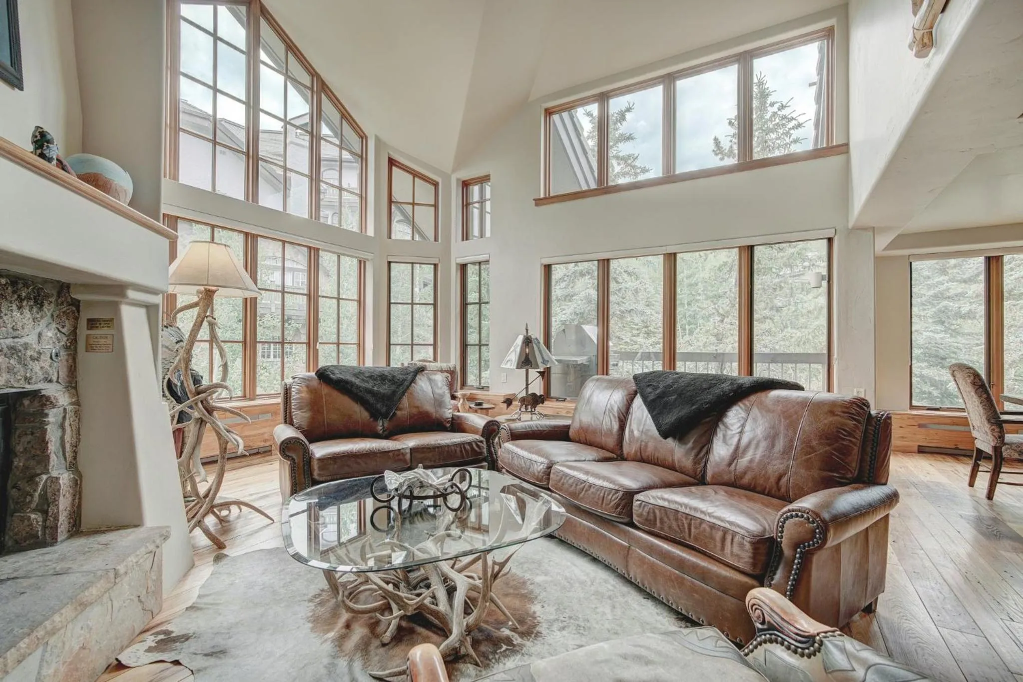 Living room in The Pines Lodge, a RockResort, by Vail Resorts