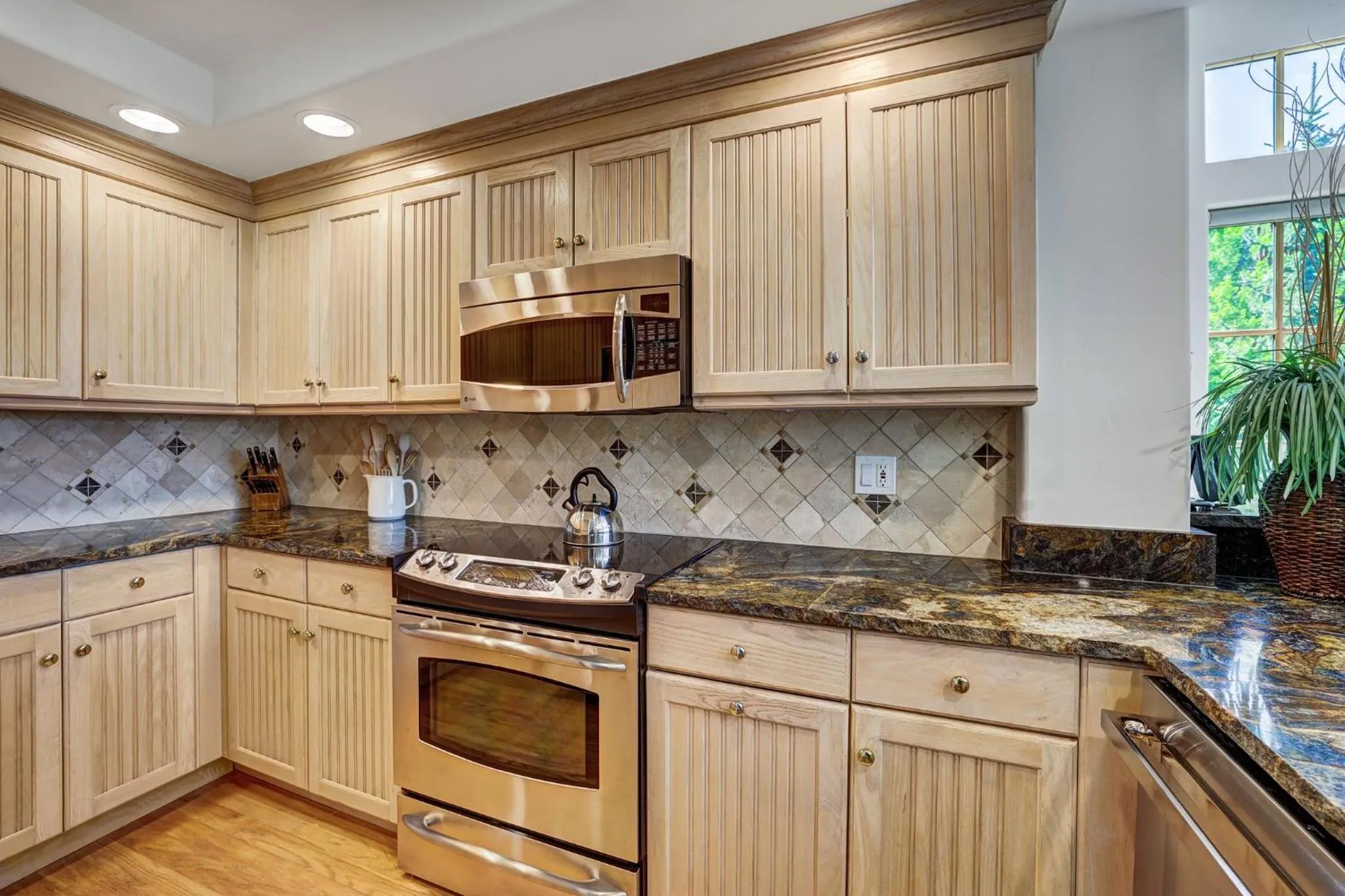 Communal kitchen in The Pines Lodge, a RockResort, by Vail Resorts