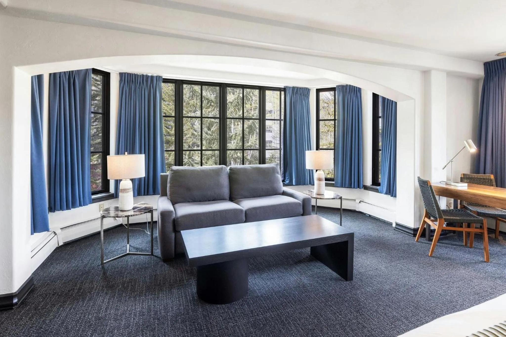 Living room in The Pines Lodge, a RockResort, by Vail Resorts