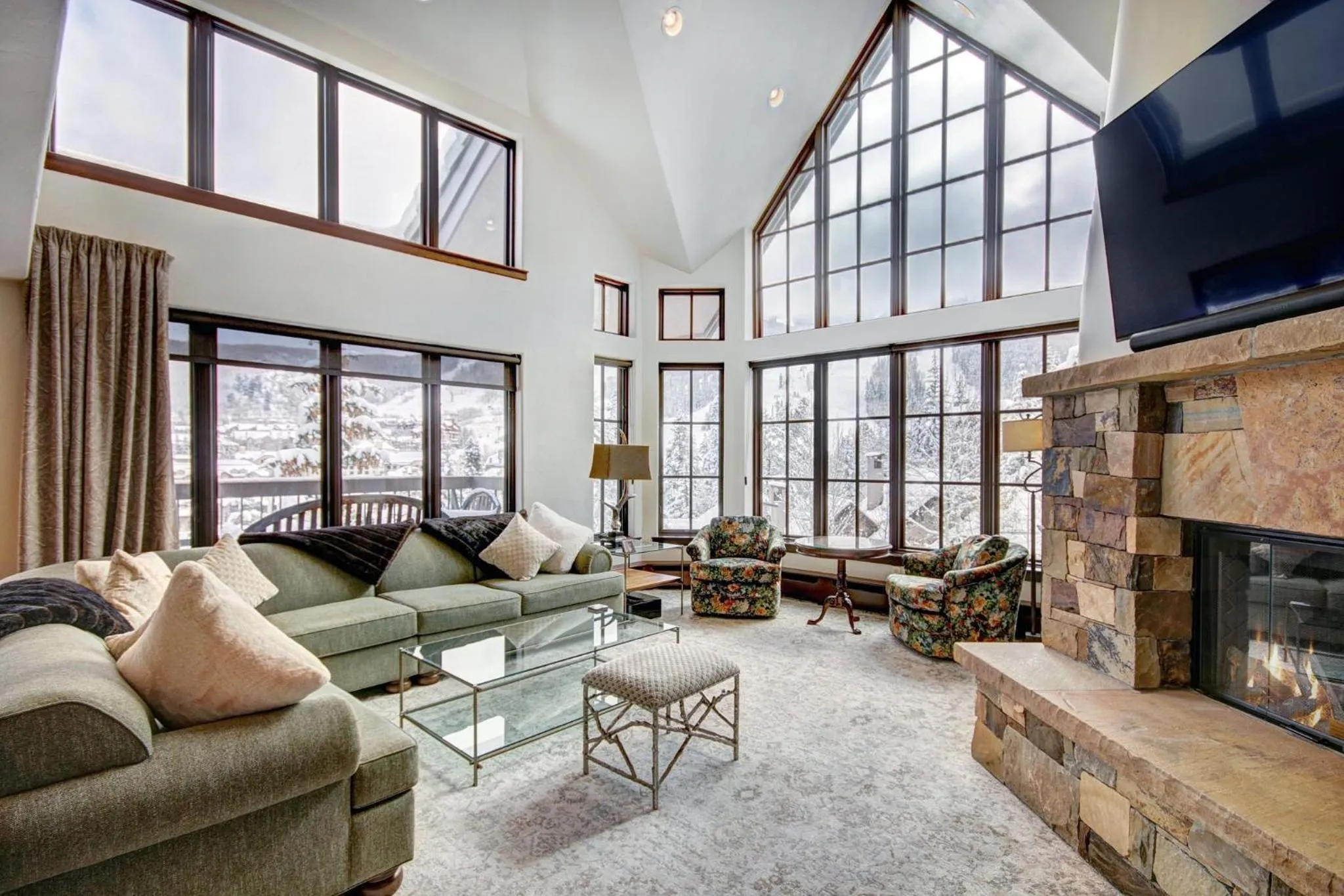 Living room in The Pines Lodge, a RockResort, by Vail Resorts