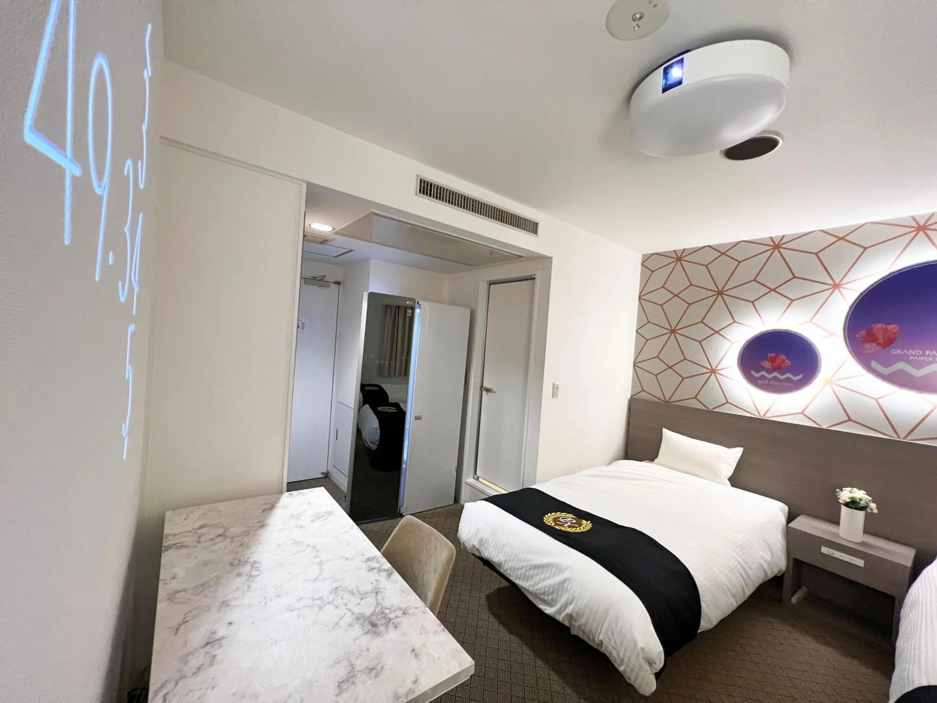 Bed in Grand Park Hotel Panex Kimitsu