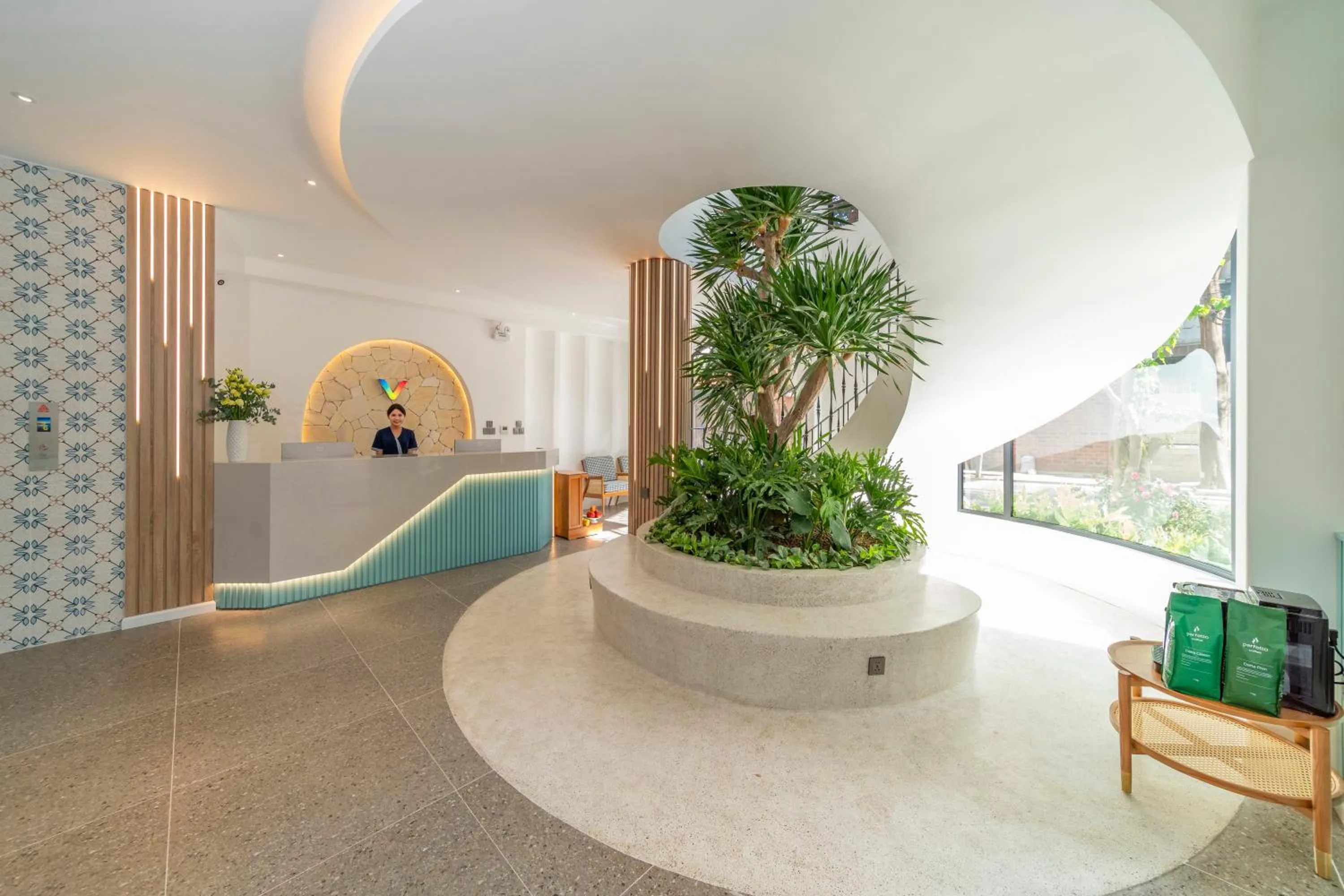 Communal lounge/ TV room in V Boutique Hotel - Complimentary refreshments