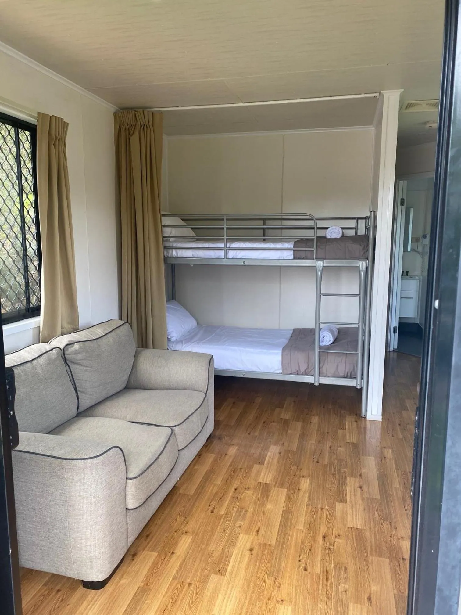 Living room, Bed in NRMA Atherton Tablelands Holiday Park