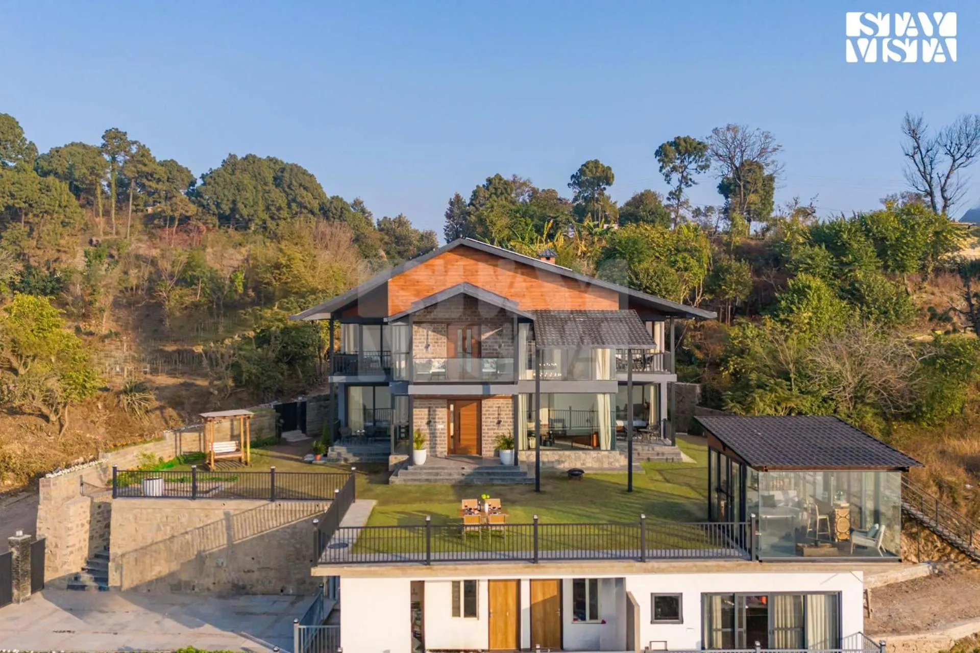 Property building in StayVista at Savara with Heated Infinity Pool and Jacuzzi