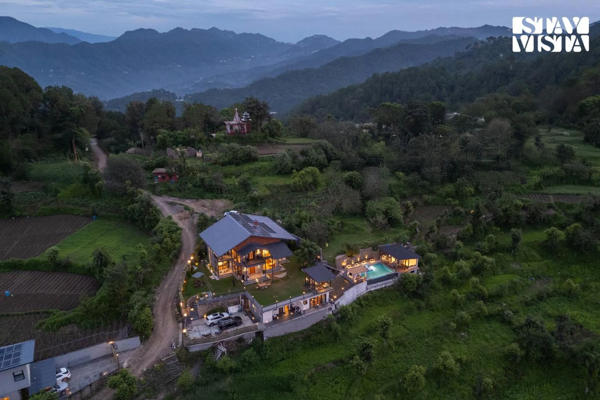 Property building in StayVista at Savara with Heated Infinity Pool and Jacuzzi