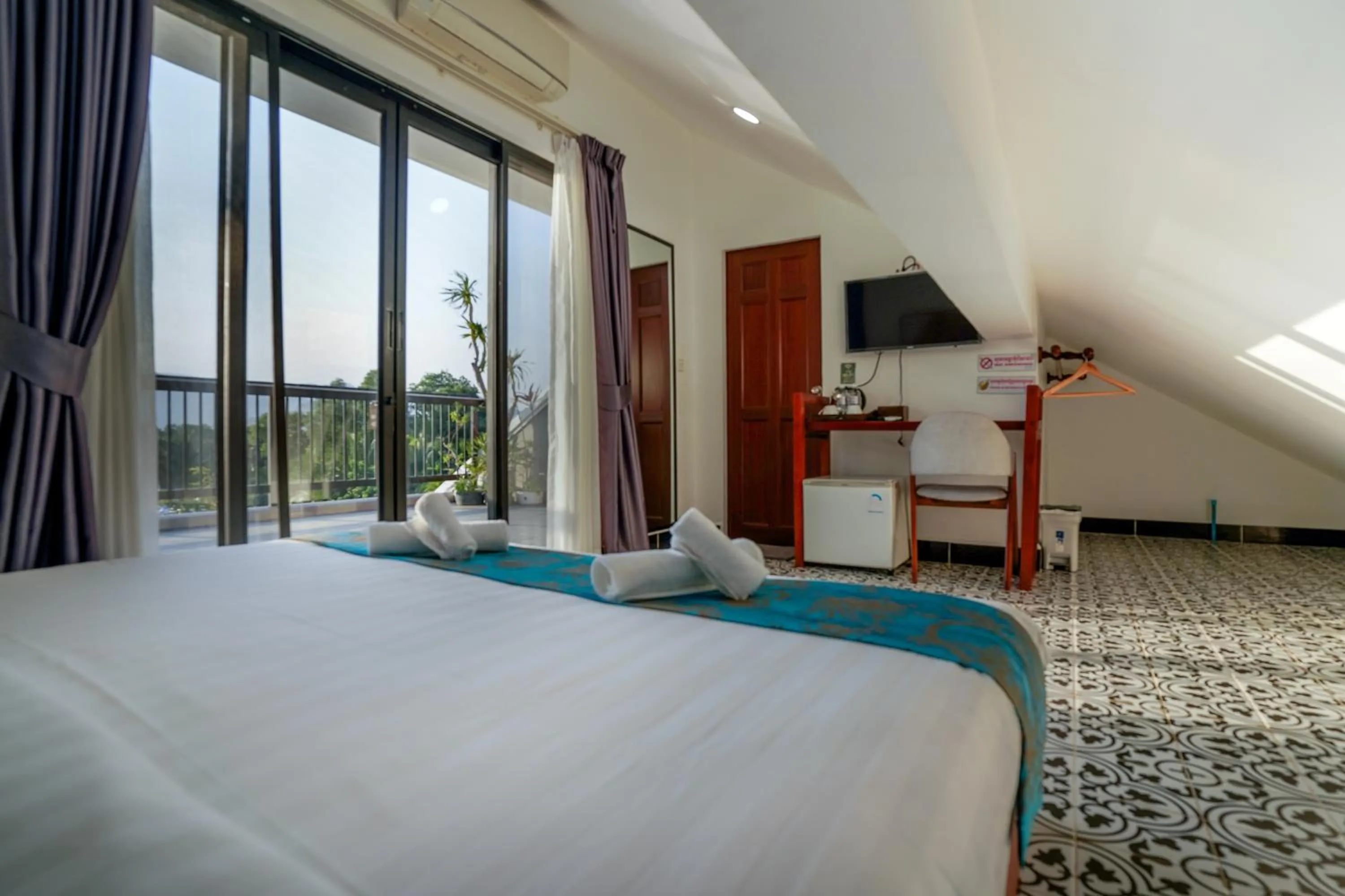 Bed in Angkearboss Villa