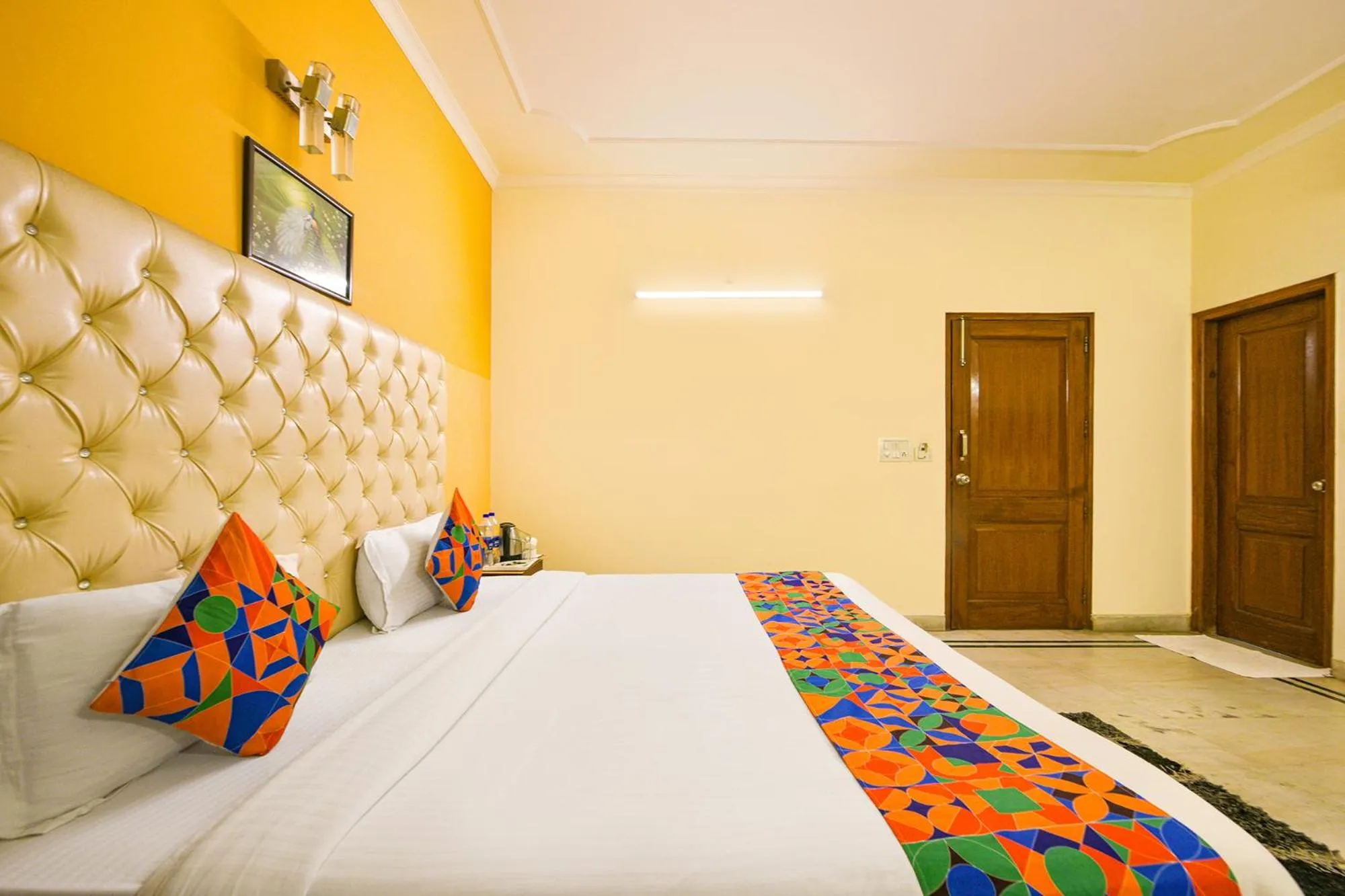 Bed in FabHotel Gracious Inn