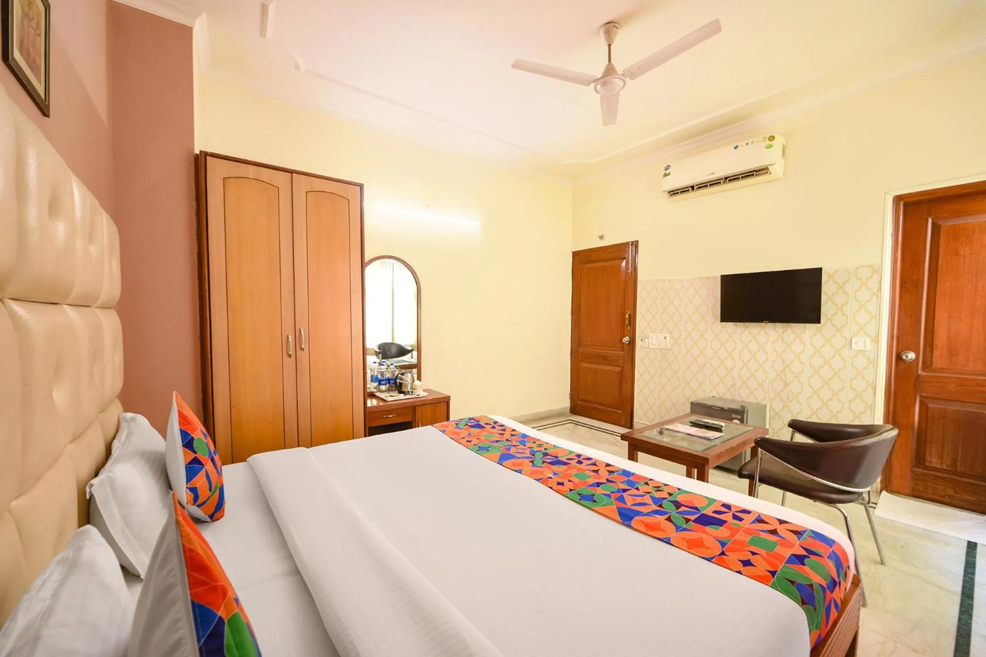 Bed in FabHotel Gracious Inn