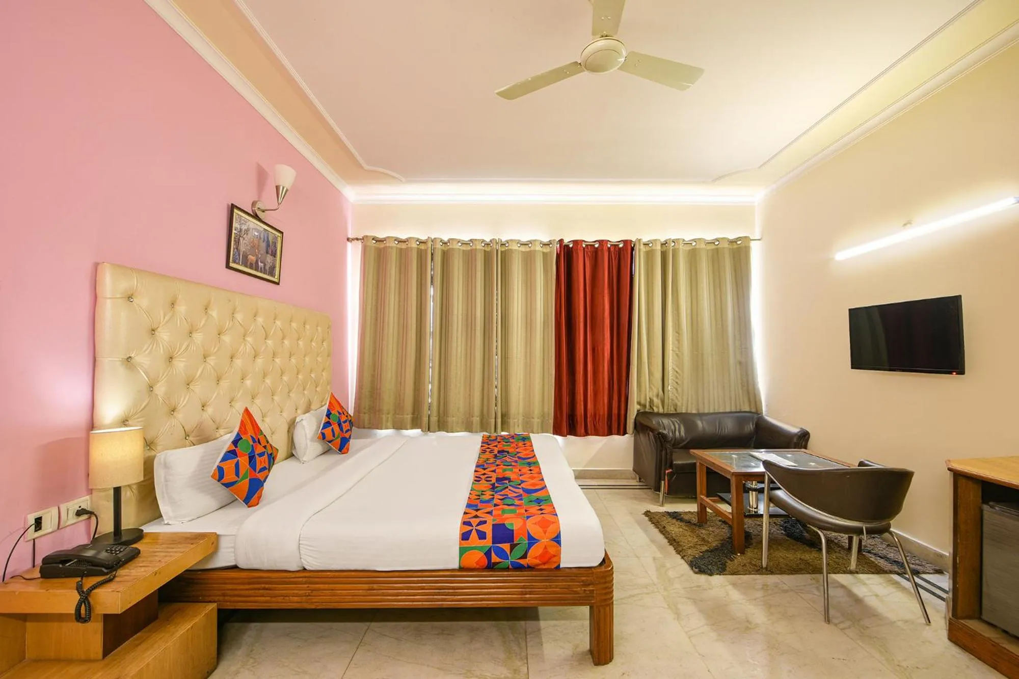 Bed in FabHotel Gracious Inn