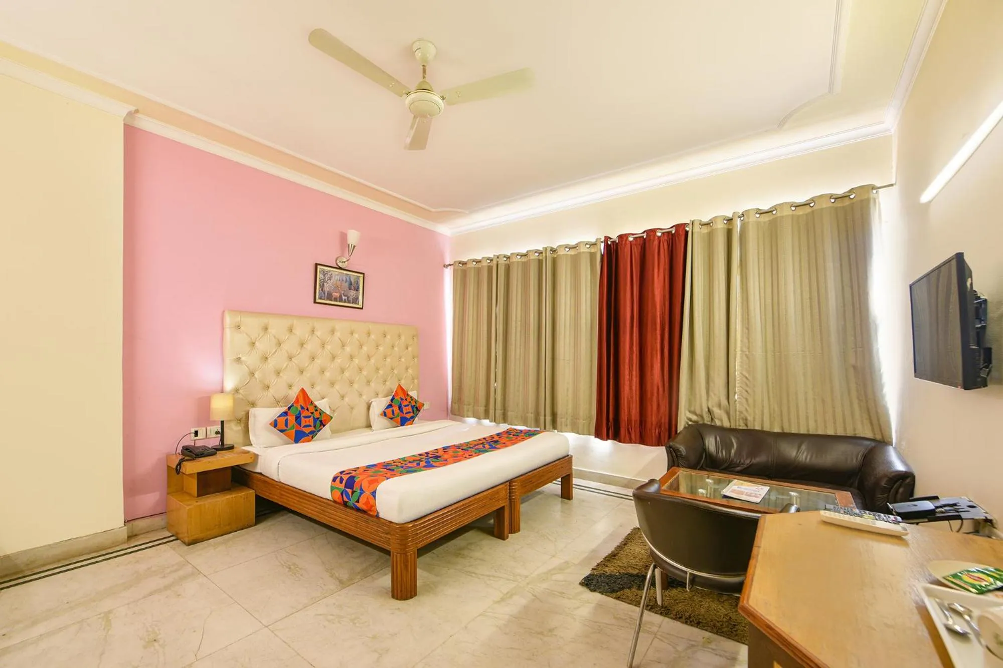 Bed in FabHotel Gracious Inn