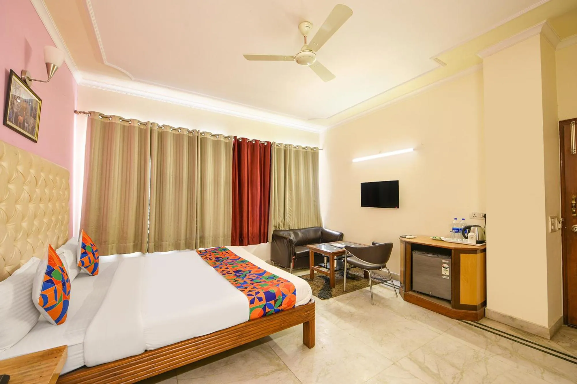 Bed in FabHotel Gracious Inn