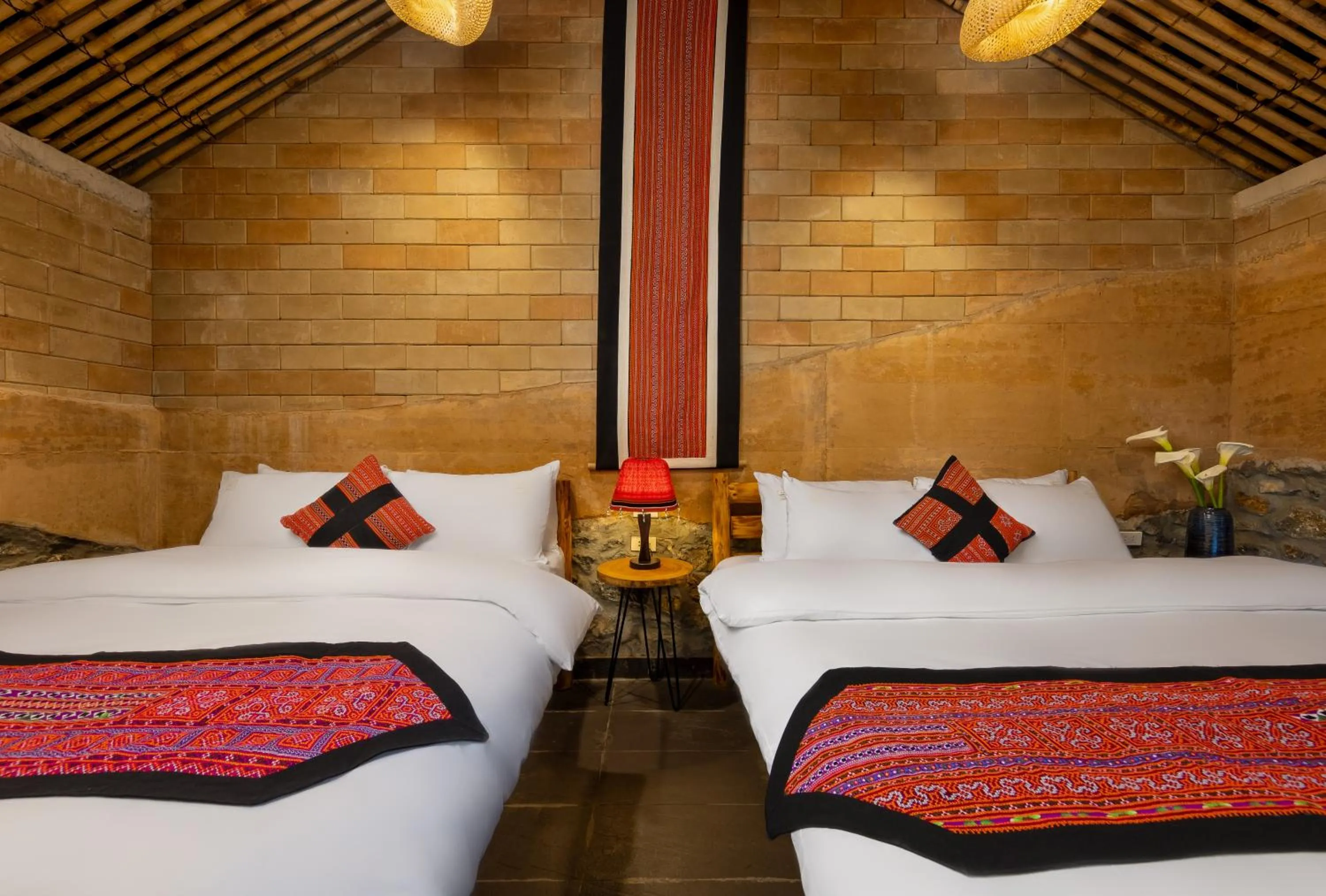 Bed in Sapaxa Spring Garden Ecolodge