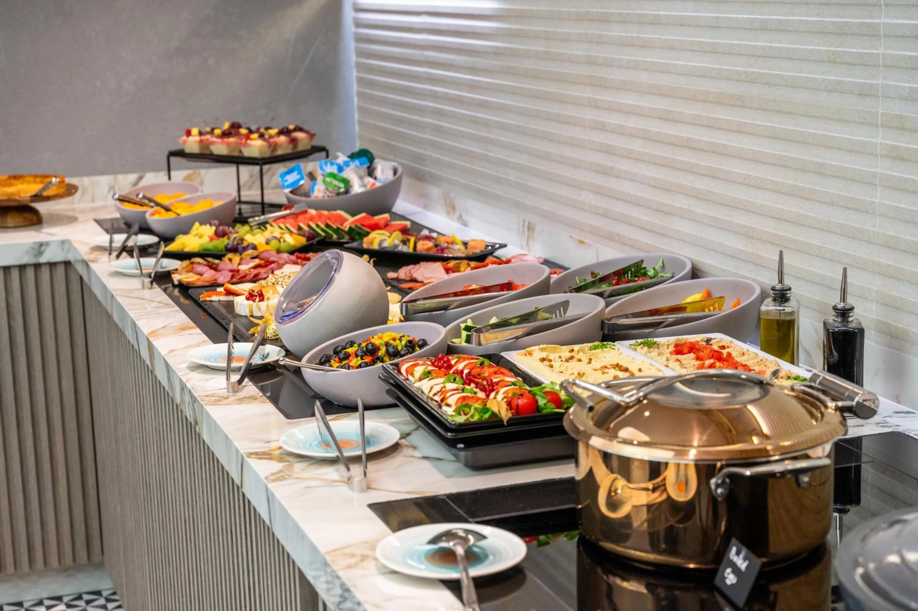 Buffet breakfast in Crowne Plaza Constanta - Mamaia Beach by IHG
