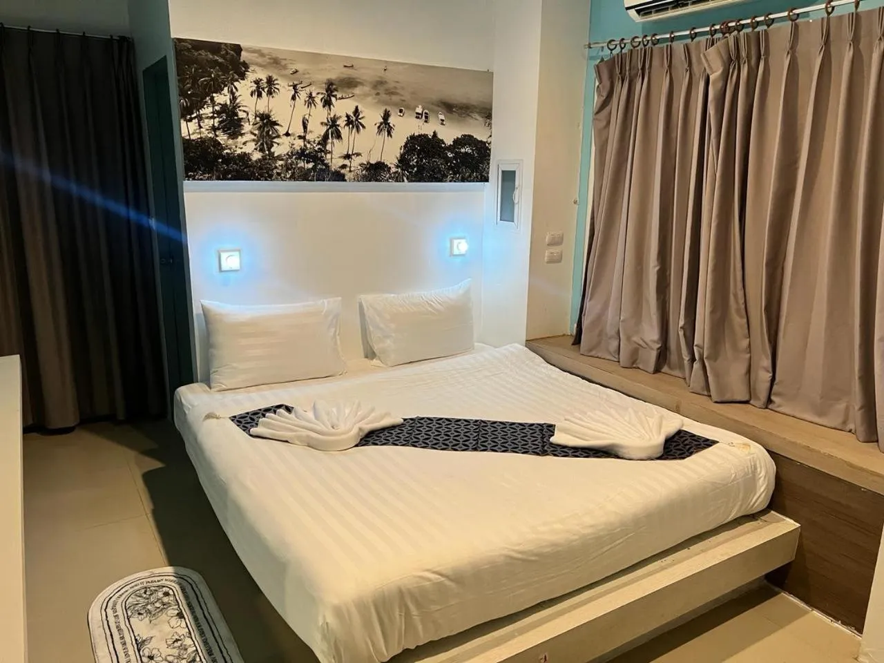 Photo of the whole room, Bed in Hotel The Journey Patong New