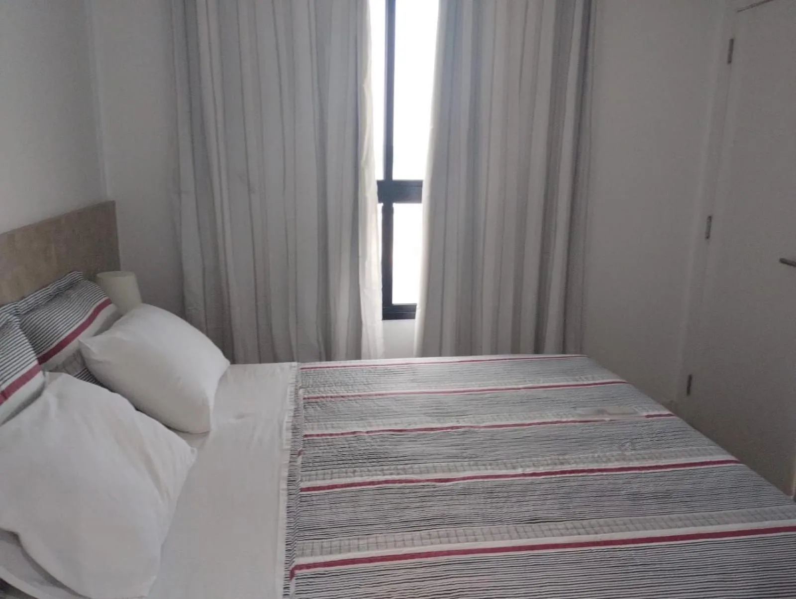 Bed in Mondial Apartments By BnbHost