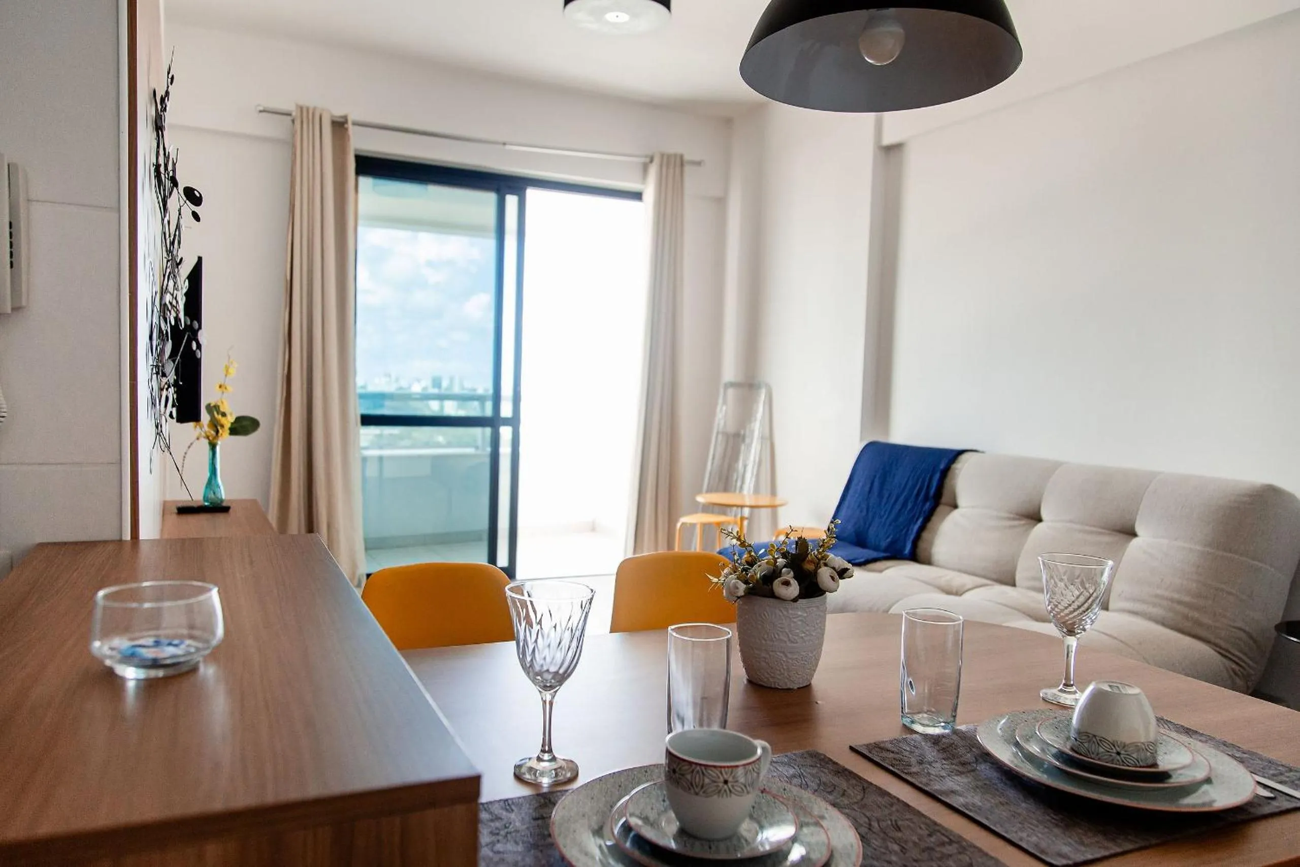 Seating area in Mondial Apartments By BnbHost