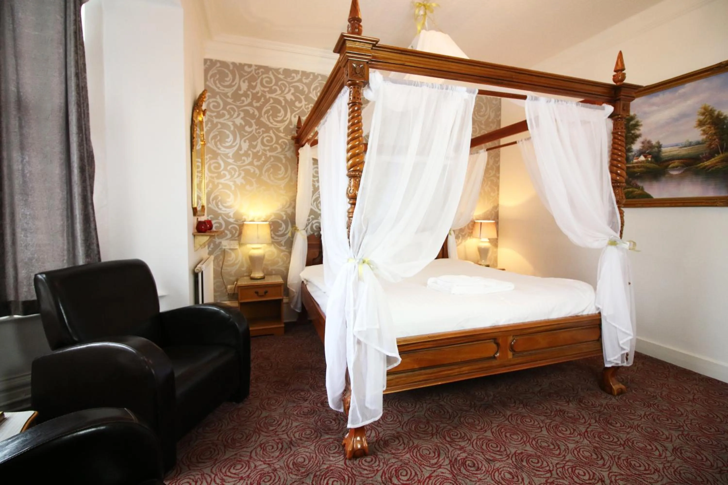 Bed in Westone Manor Hotel