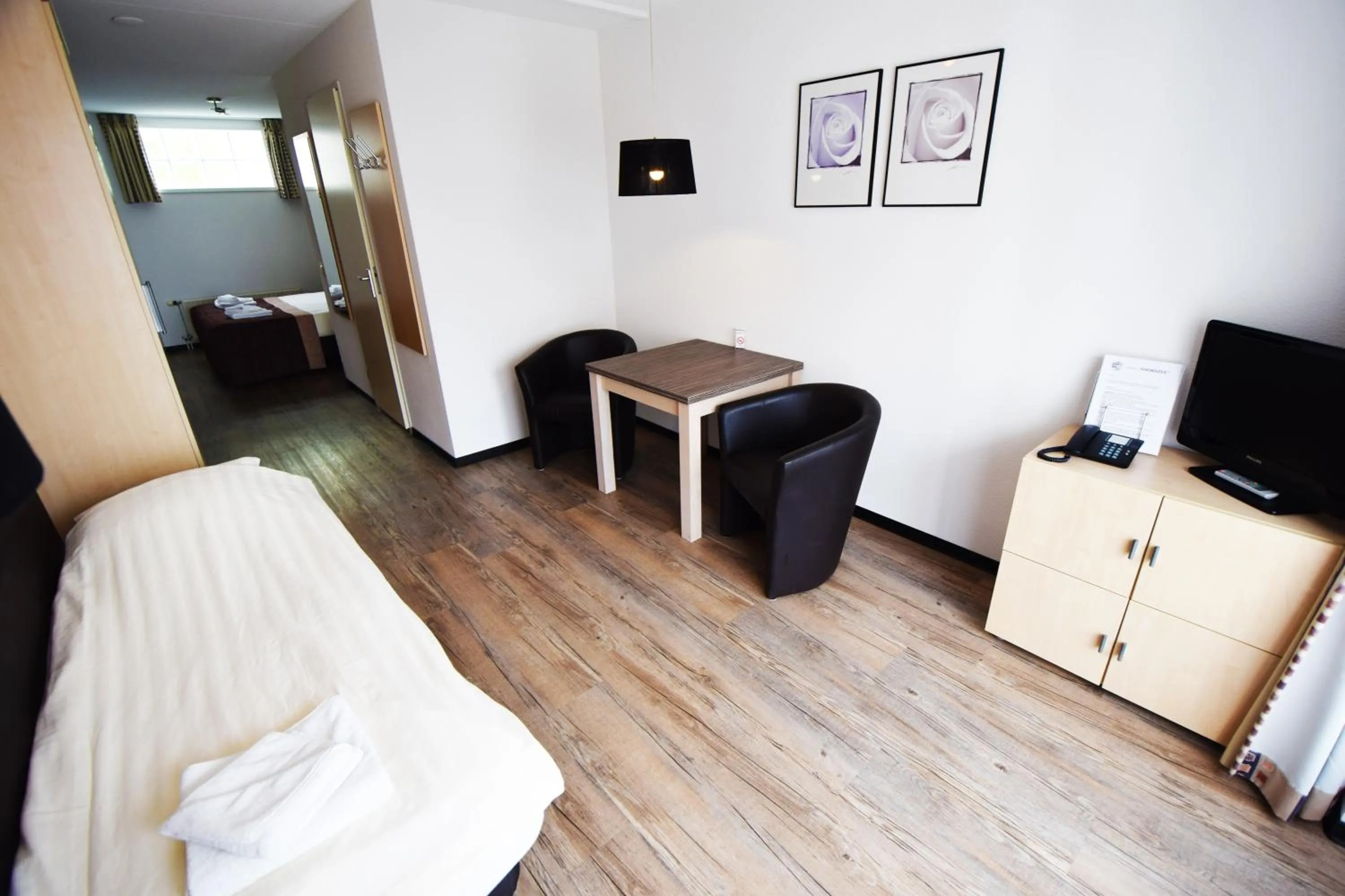 Photo of the whole room, Bed in Hotel Noordzee