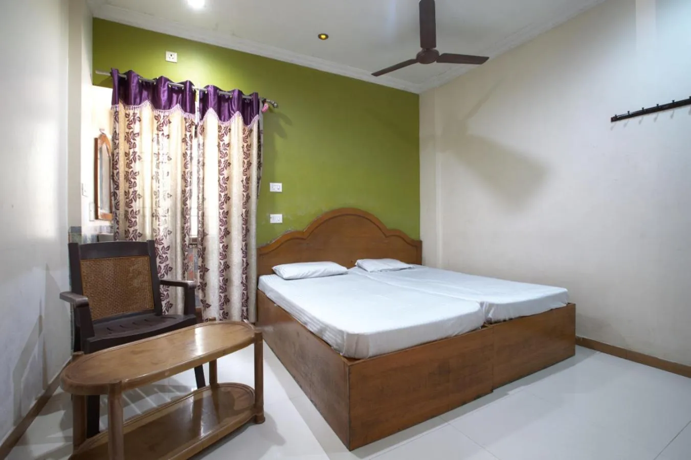 Bed in JAYA BHARATHI LODGE
