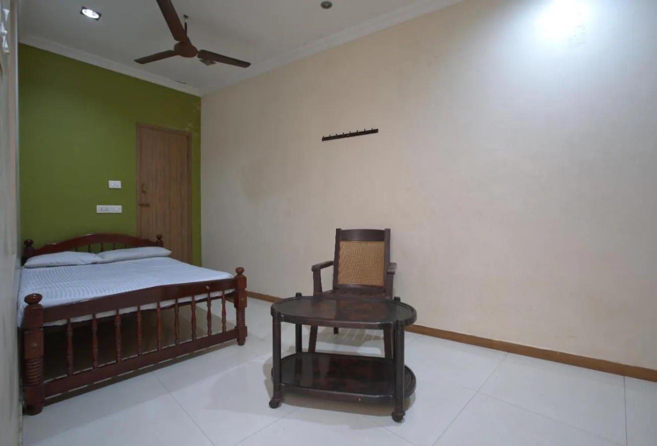 Bed in JAYA BHARATHI LODGE