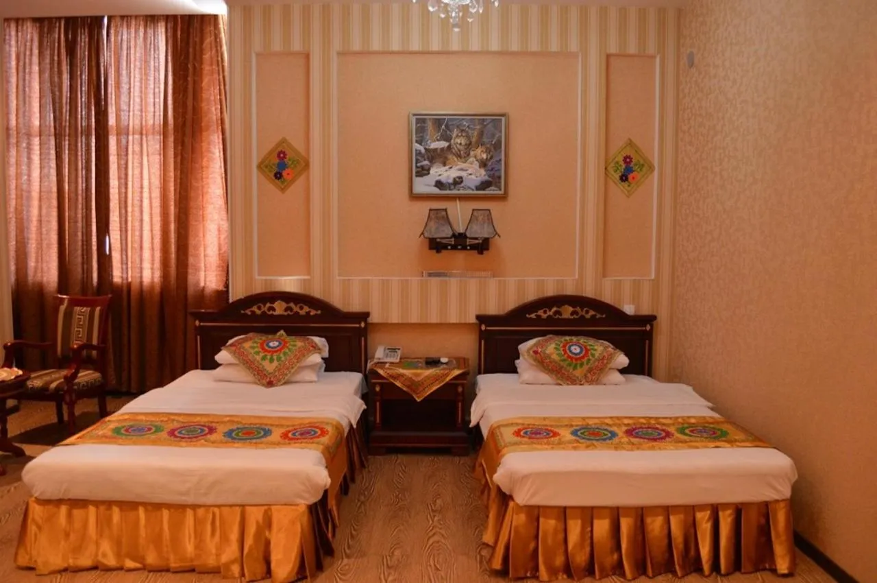 Bed in ORIYO DUSHANBE HOTEL