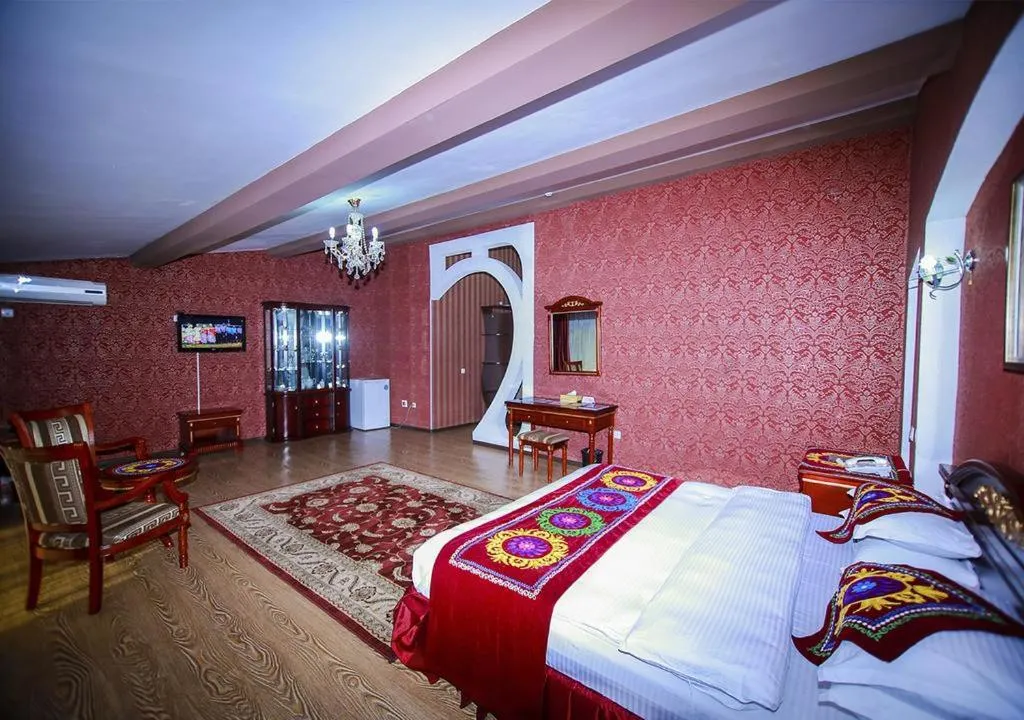 Bed in ORIYO DUSHANBE HOTEL