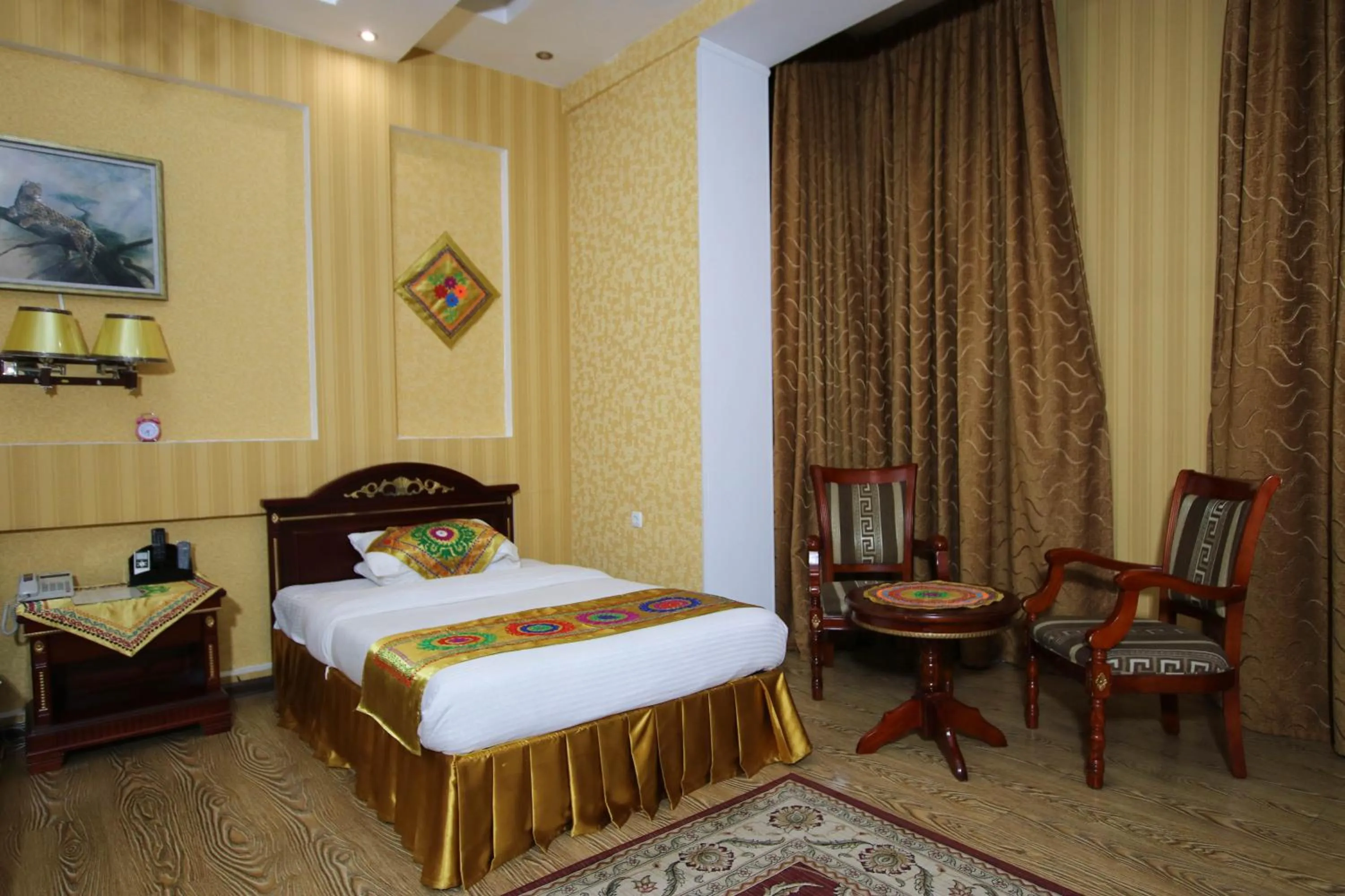 Bed in ORIYO DUSHANBE HOTEL