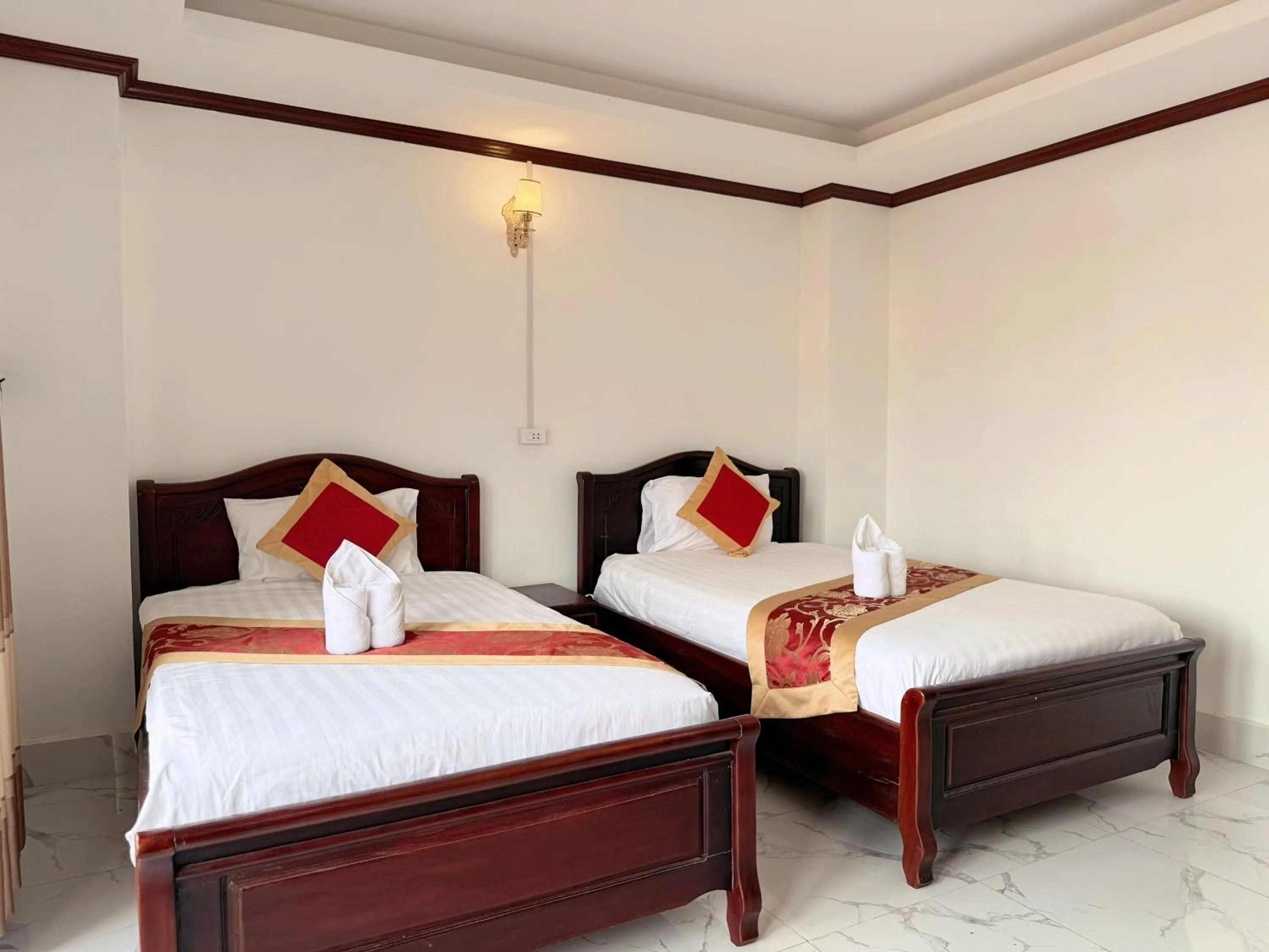 Bed in Vangvieng Sisavang Mountain View Hotel