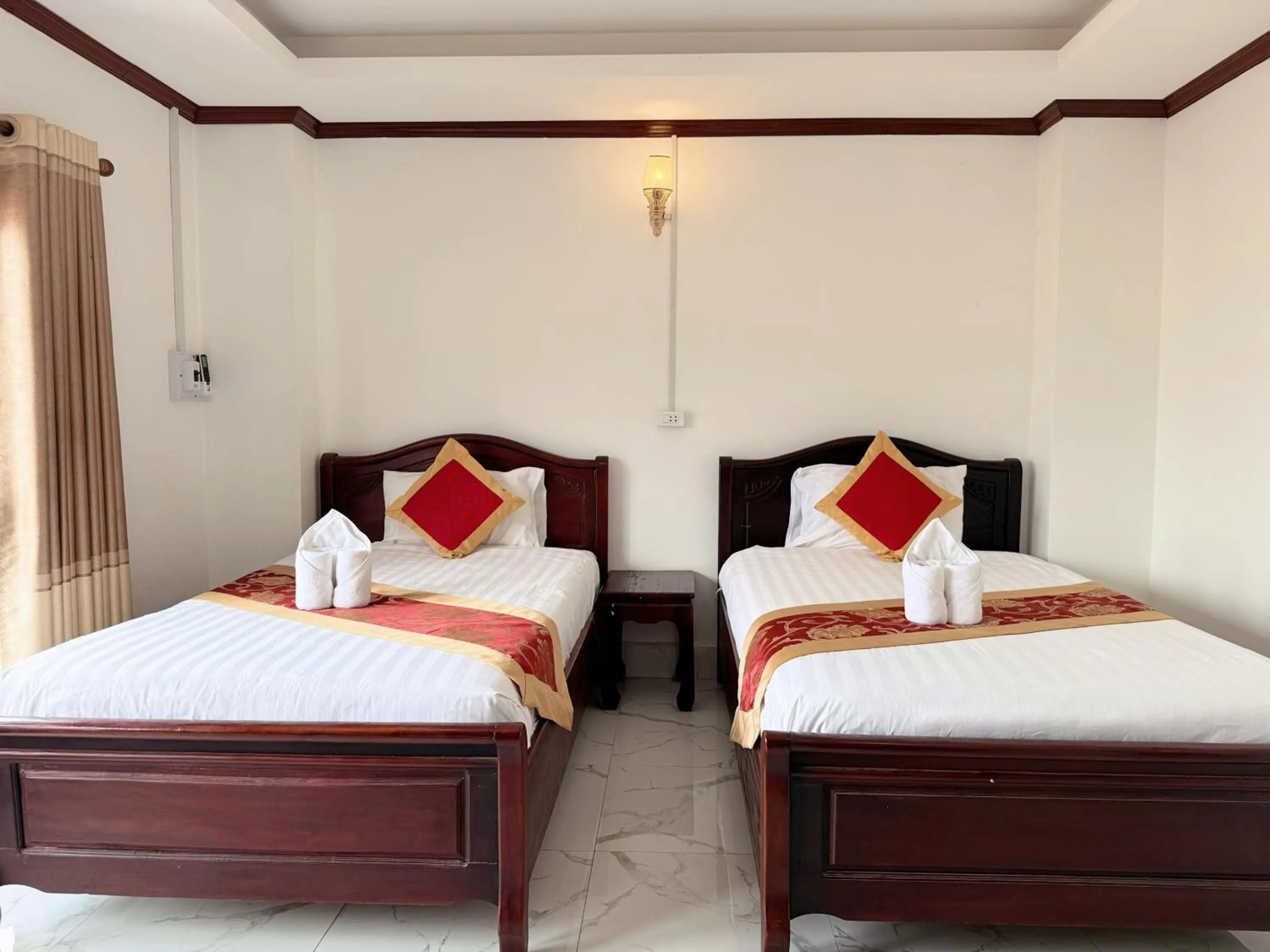 Bed in Vangvieng Sisavang Mountain View Hotel