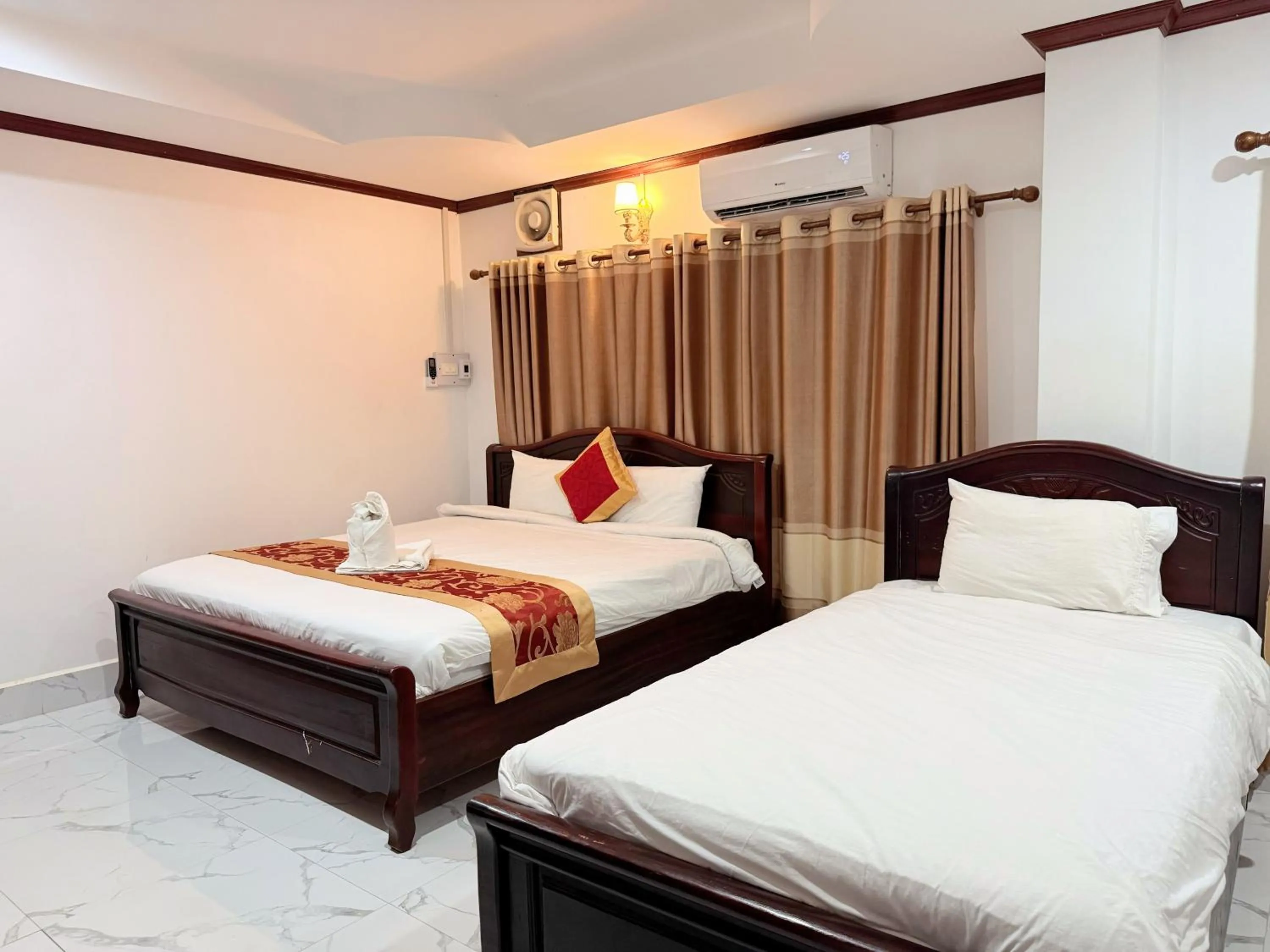 Bed in Vangvieng Sisavang Mountain View Hotel