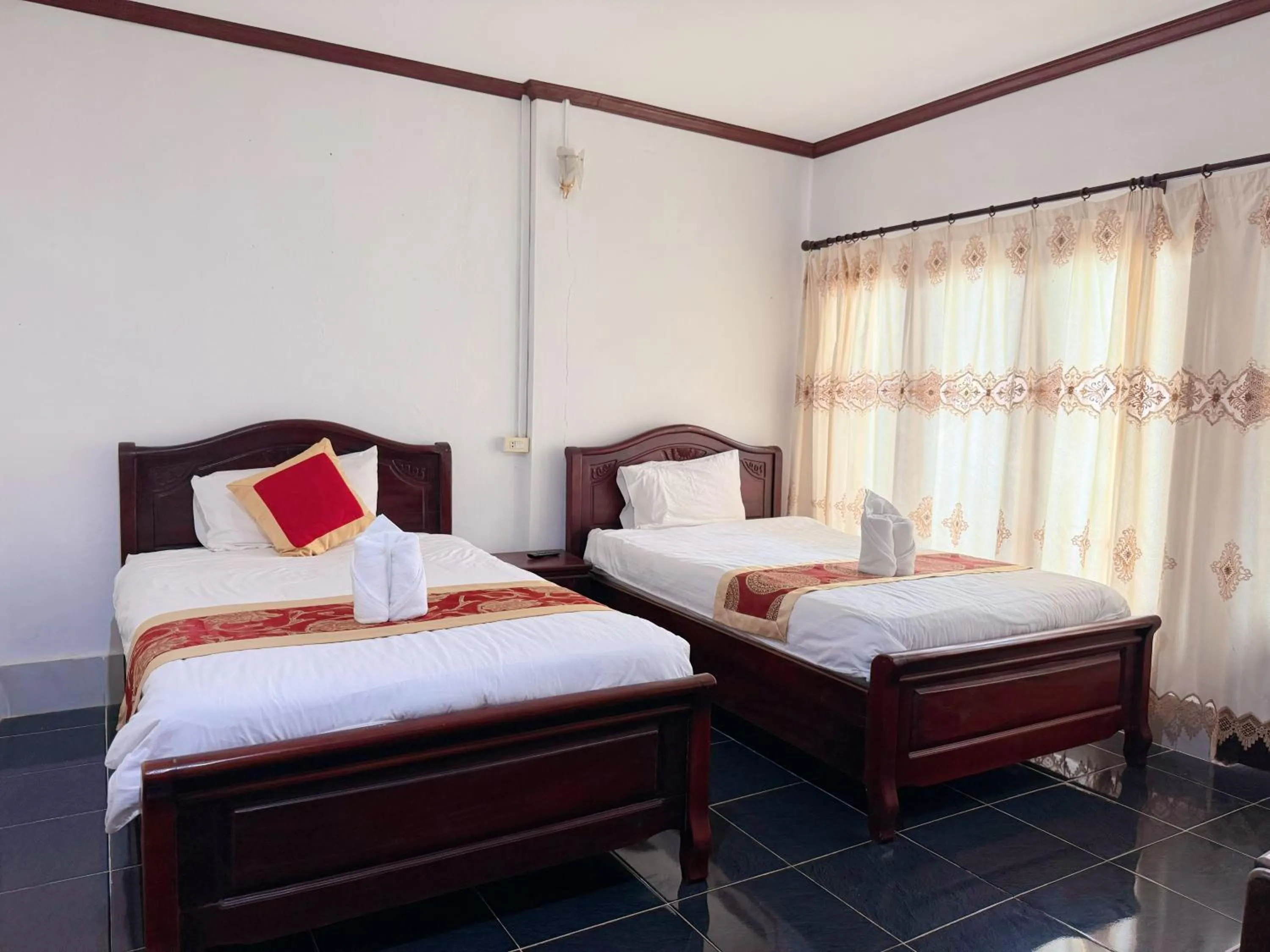 Bed in Vangvieng Sisavang Mountain View Hotel