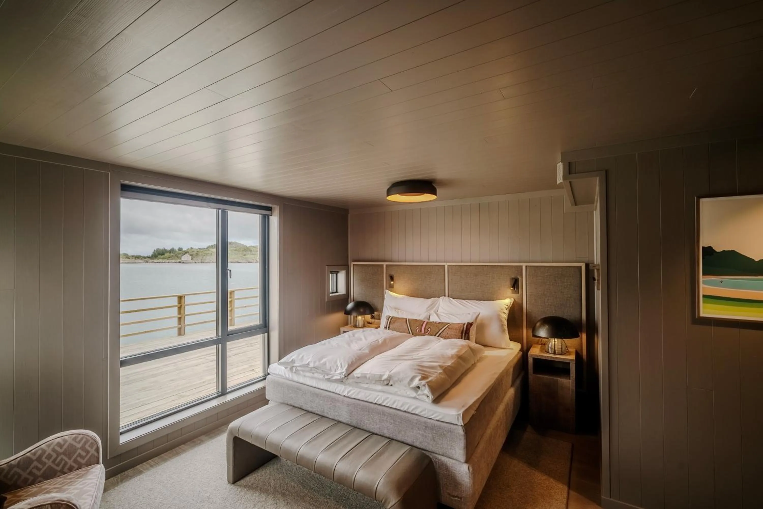 Photo of the whole room, Bed in Henningsvær Bryggehotell - by Classic Norway Hotels