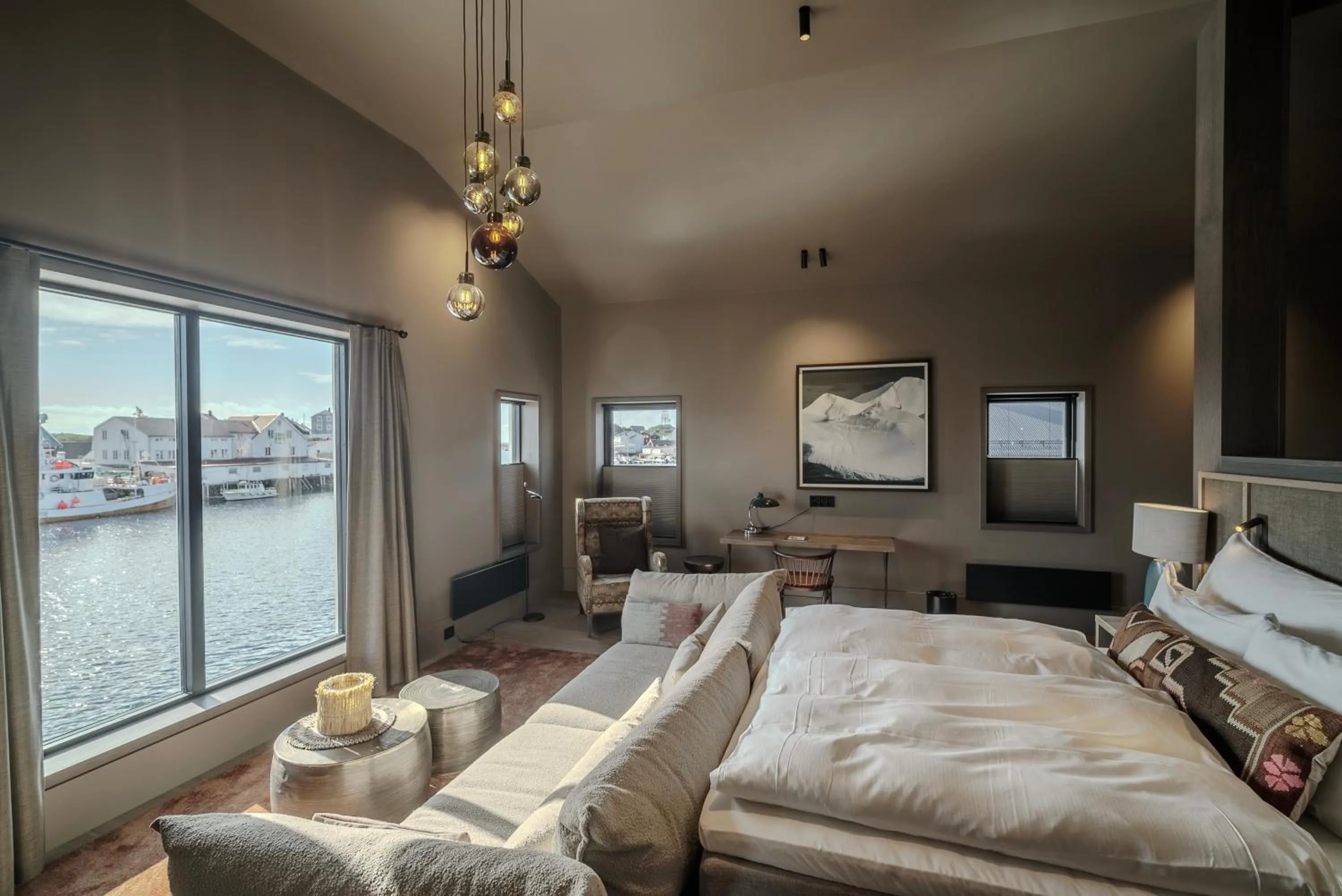 Photo of the whole room, Bed in Henningsvær Bryggehotell - by Classic Norway Hotels