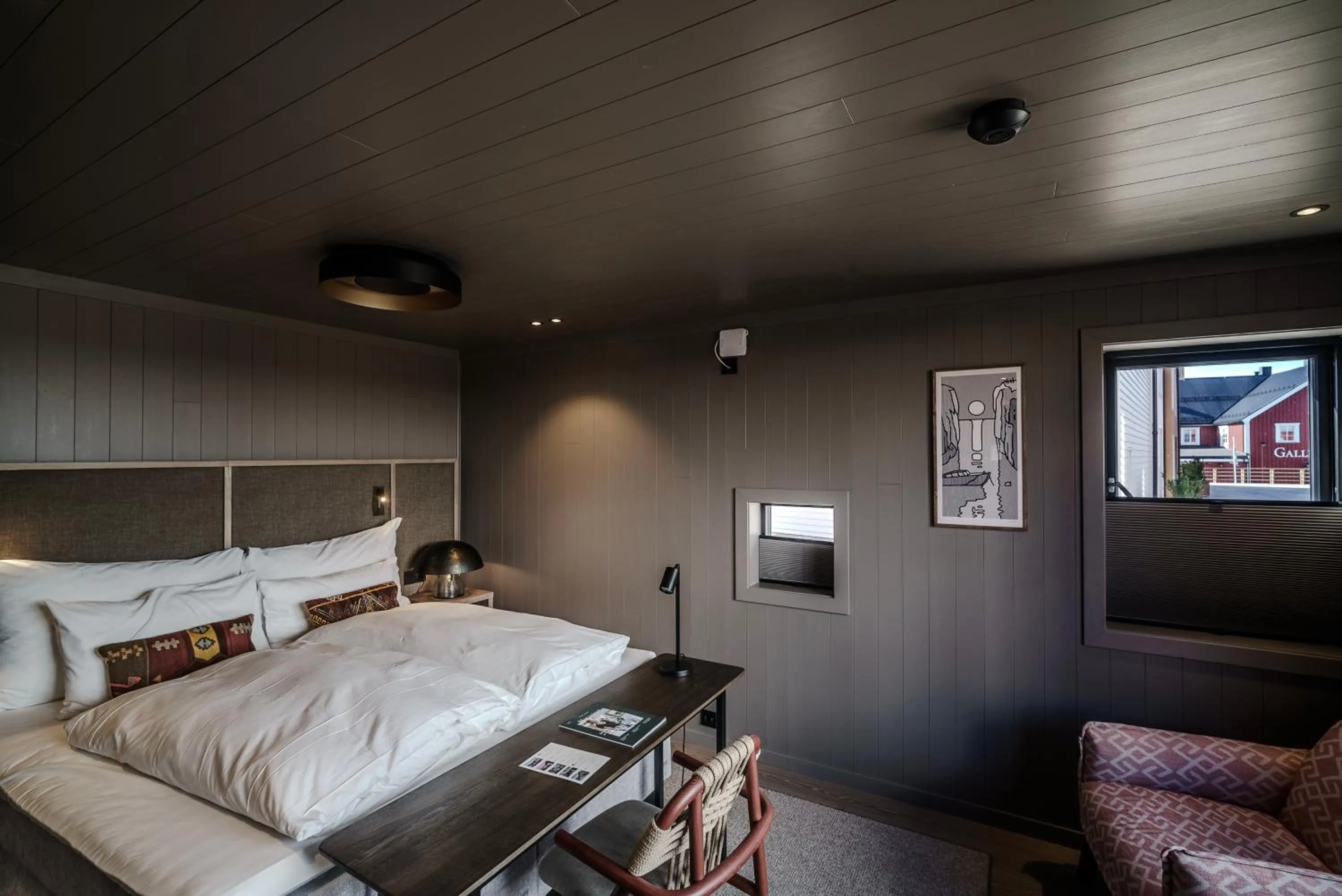 Bed in Henningsvær Bryggehotell - by Classic Norway Hotels