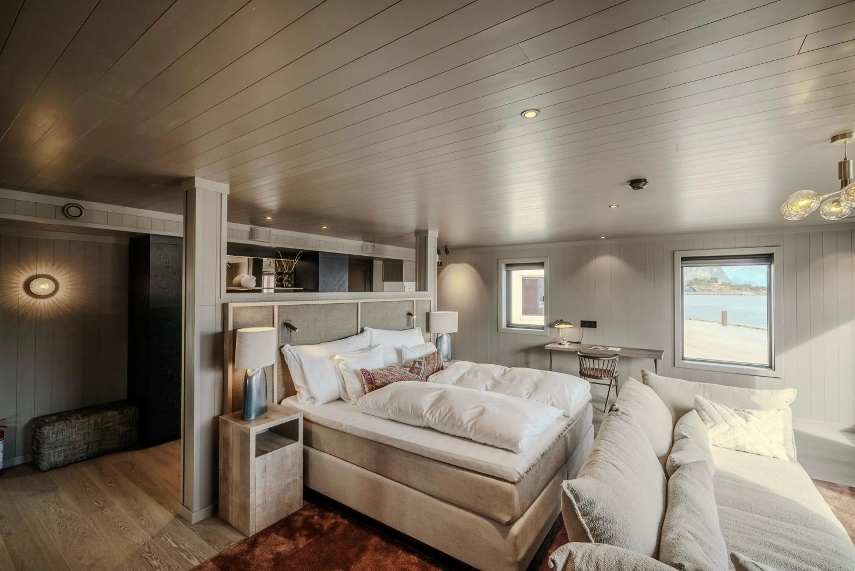 Bedroom, Bed in Henningsvær Bryggehotell - by Classic Norway Hotels