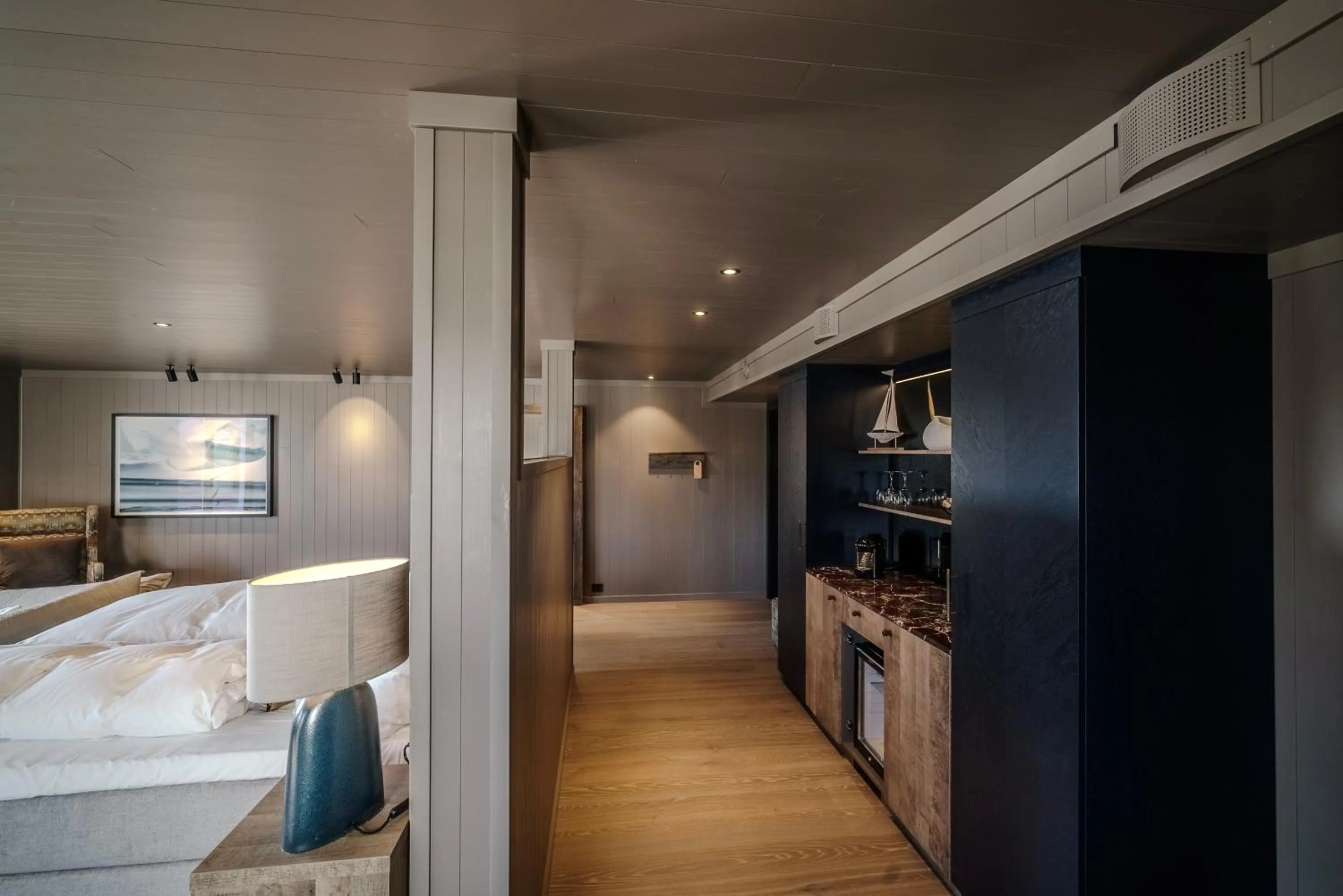 Photo of the whole room, Bed in Henningsvær Bryggehotell - by Classic Norway Hotels