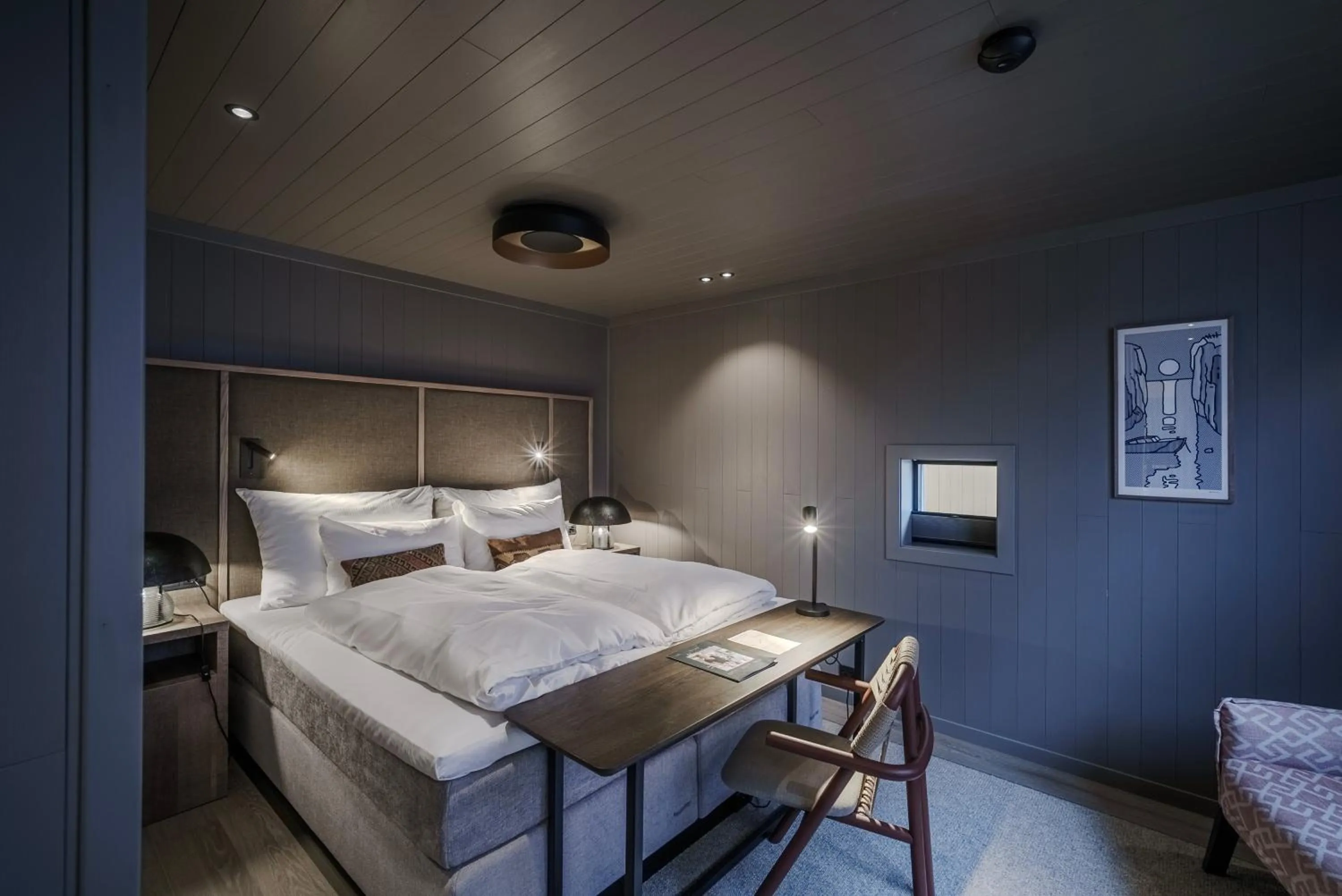 Bed in Henningsvær Bryggehotell - by Classic Norway Hotels