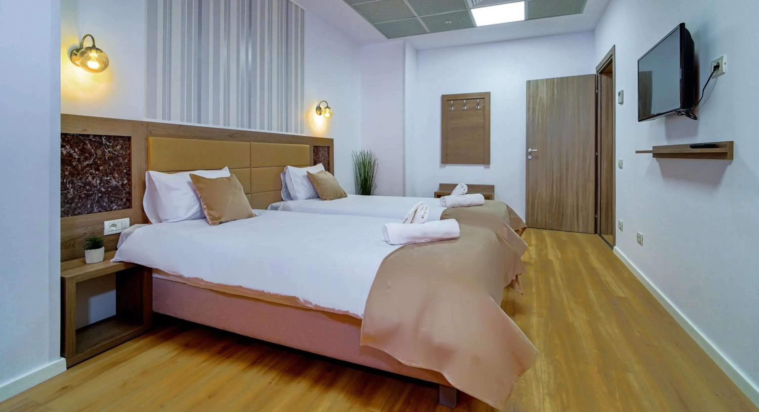 Bed in Sir Fundeni Hotel