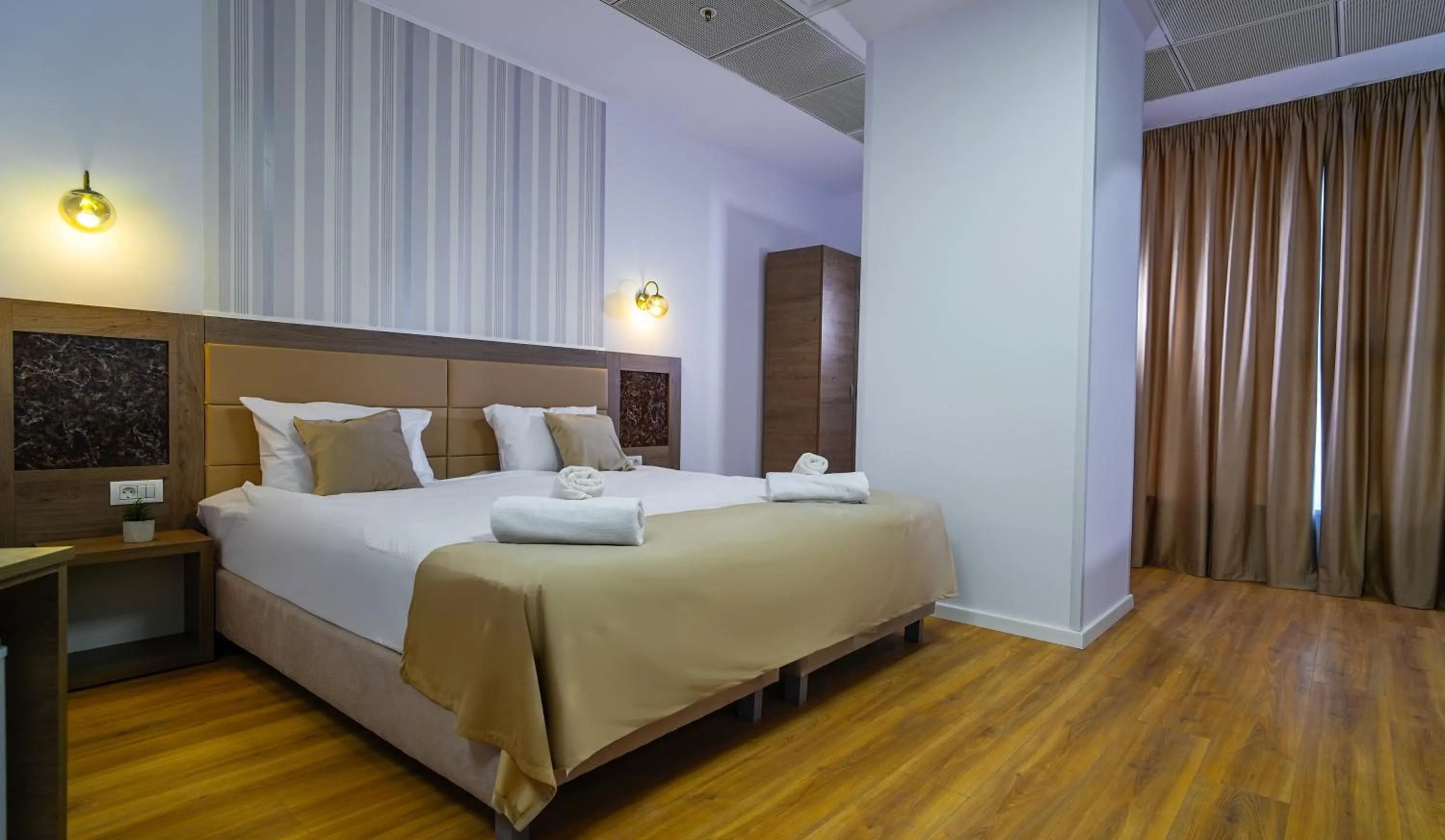 Bed in Sir Fundeni Hotel