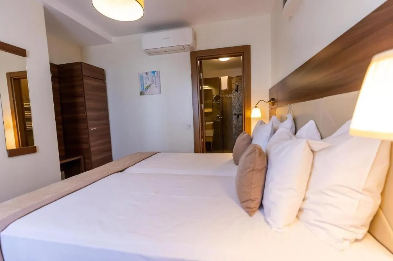 Bed in Sir Fundeni Hotel