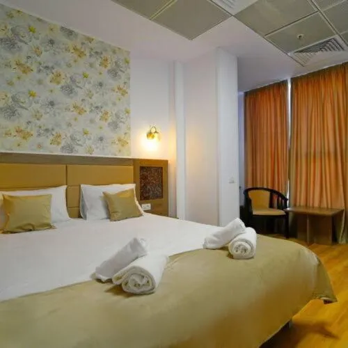 Bed in Sir Fundeni Hotel