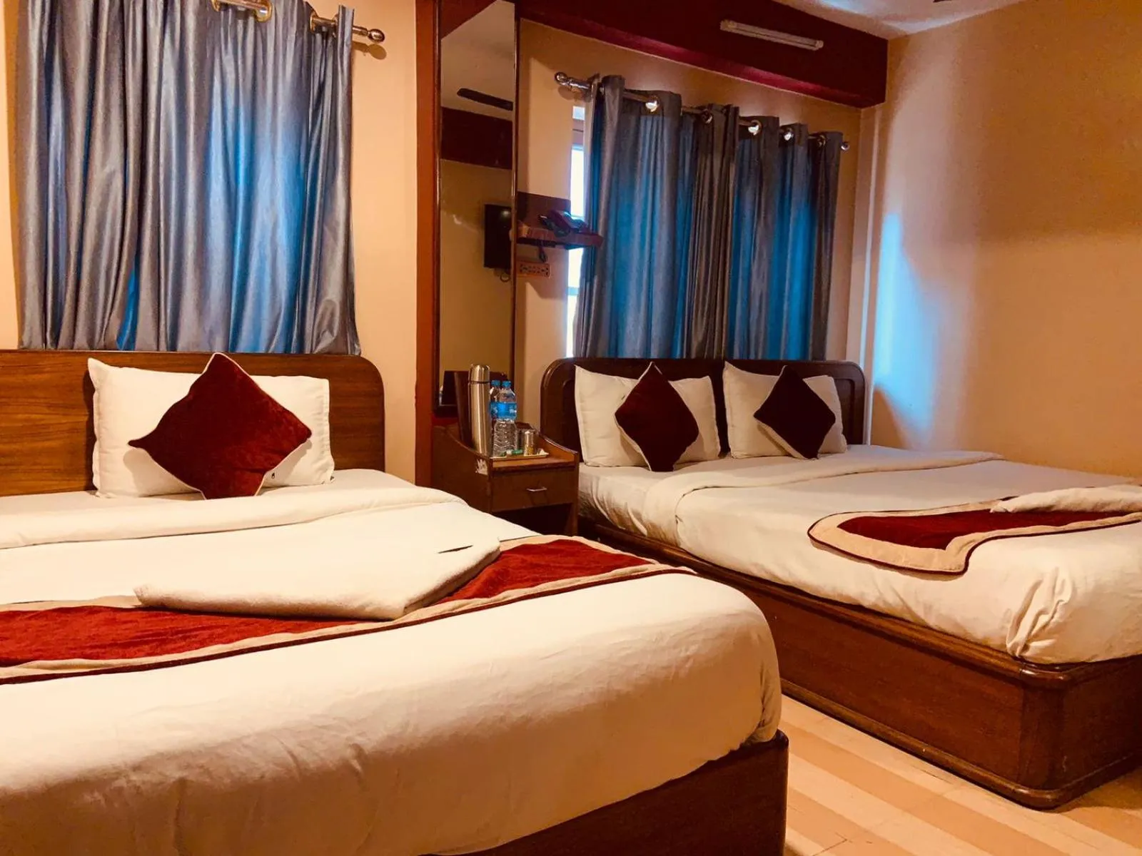 Bed in Shiva Shankar Hotel