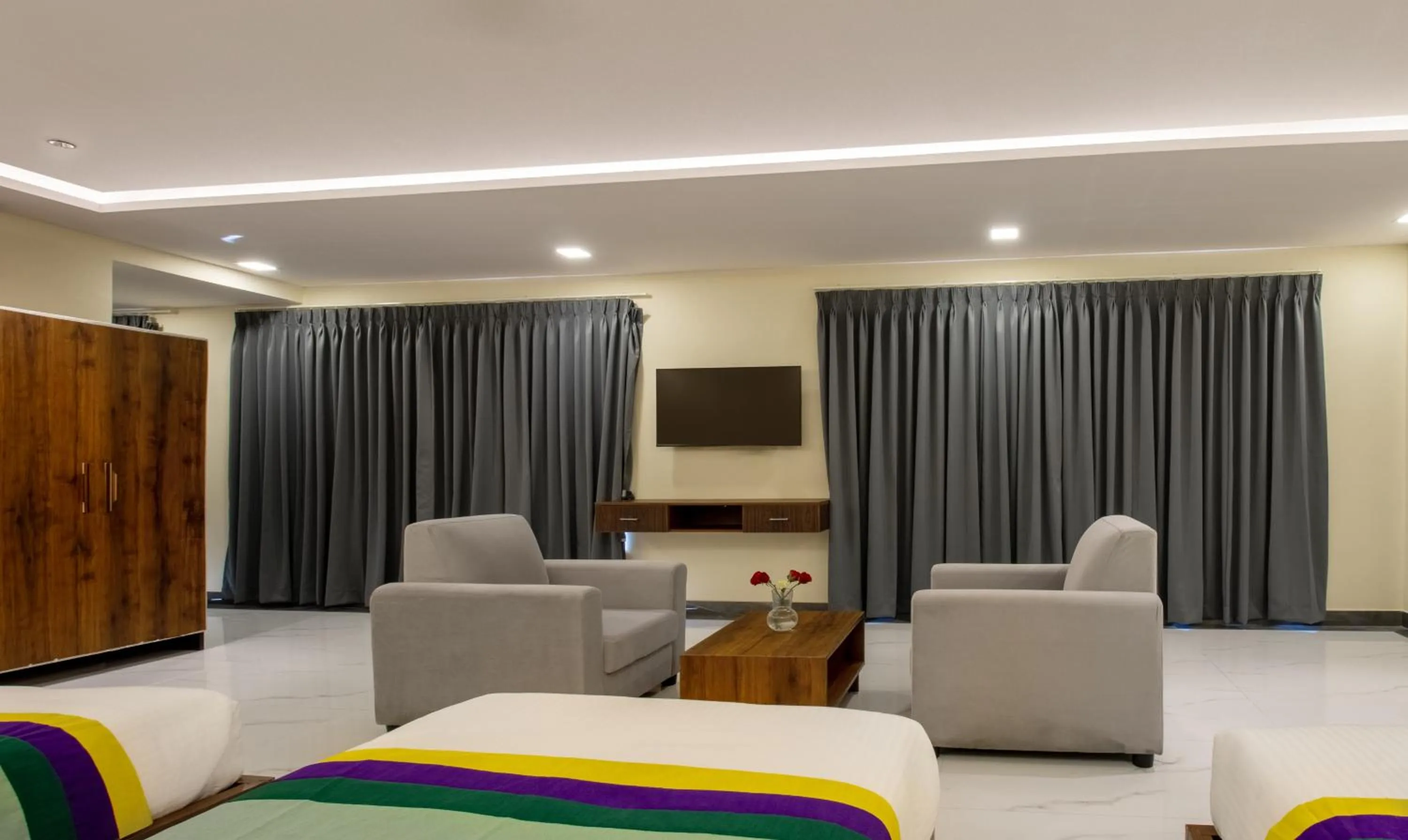 Bedroom in Treebo Jaguar Comforts, 3 Kms From Mahatma Gandhi Park