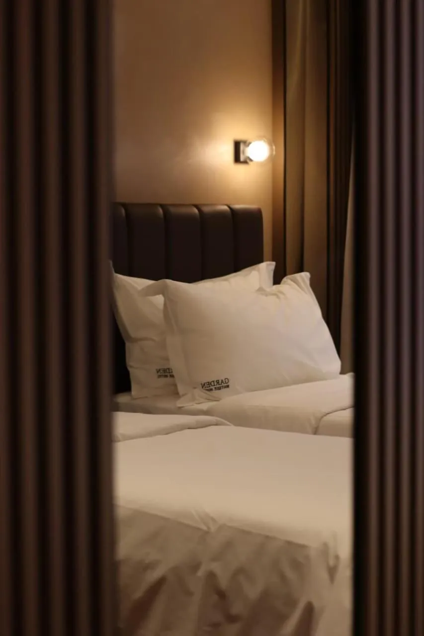 Bed in Garden Boutique Hotel