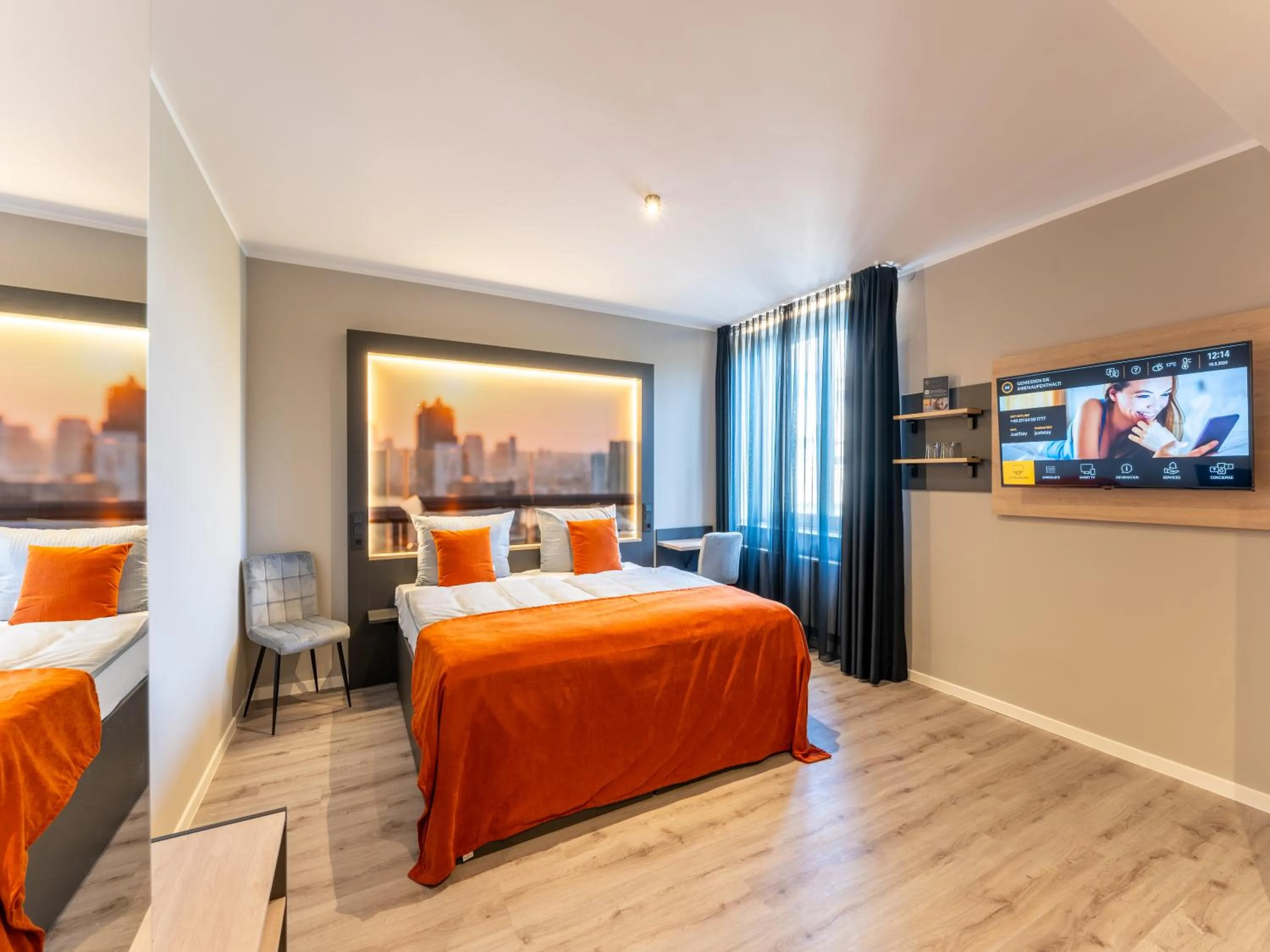 TV and multimedia, Bed in JustStay Essen Hotel & Apartments