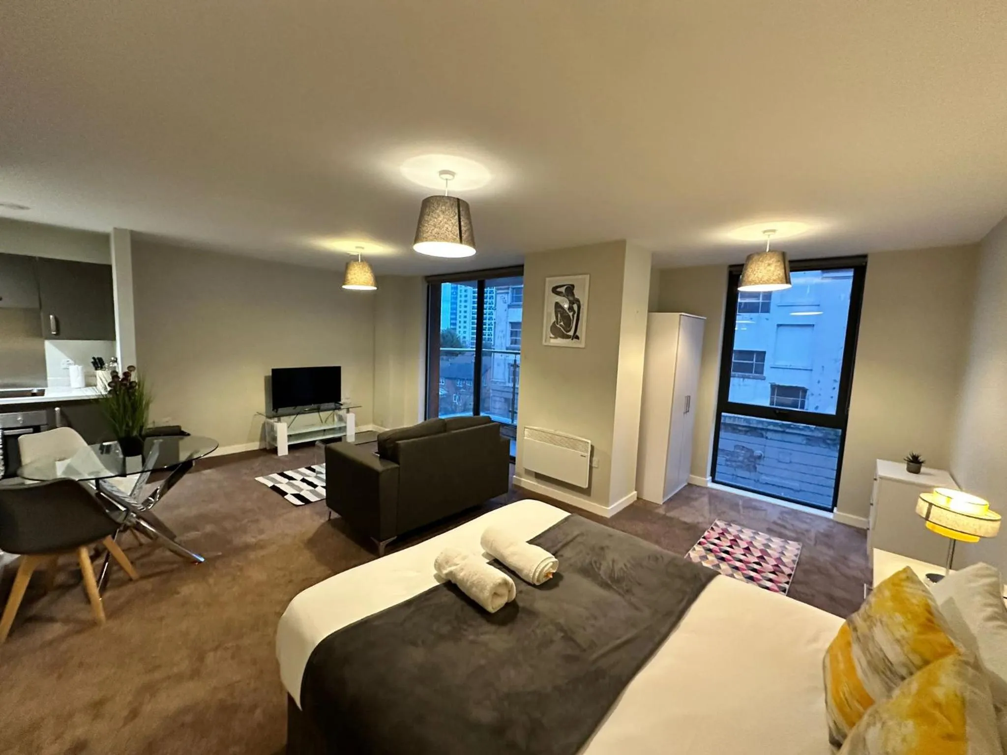Living room, Bed in Adelphi Wharf Apartments by Beehosting