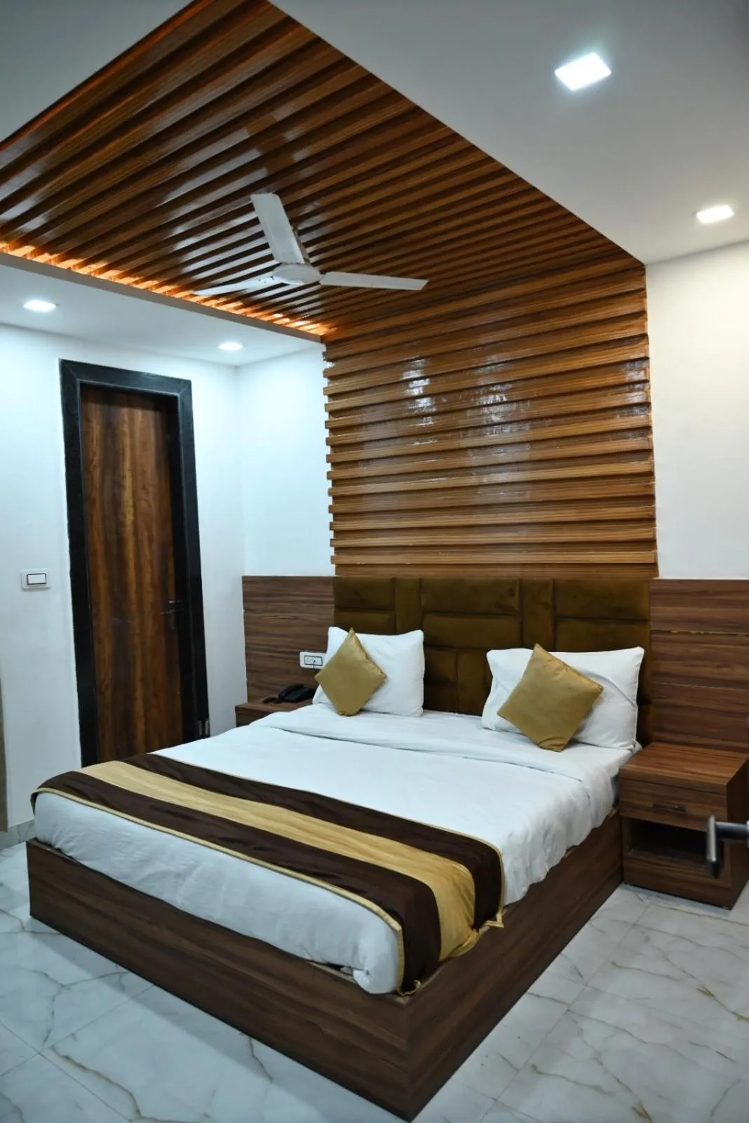 Bed in Hotel Navraj Palace