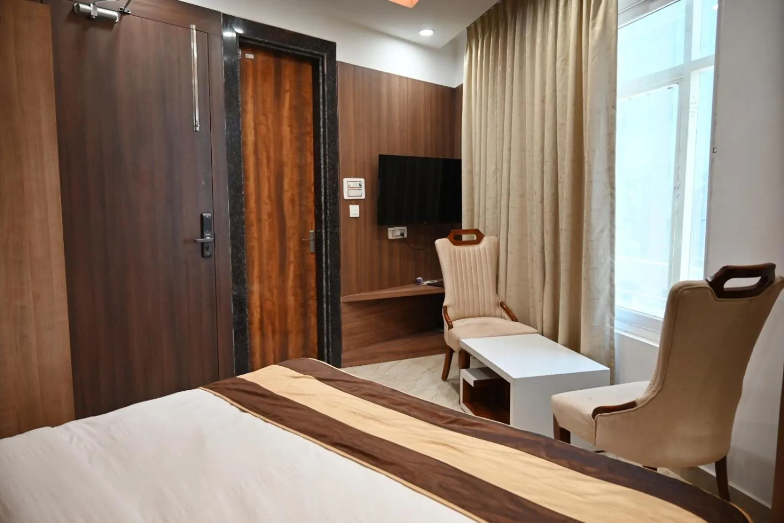 Bed in Hotel Navraj Palace