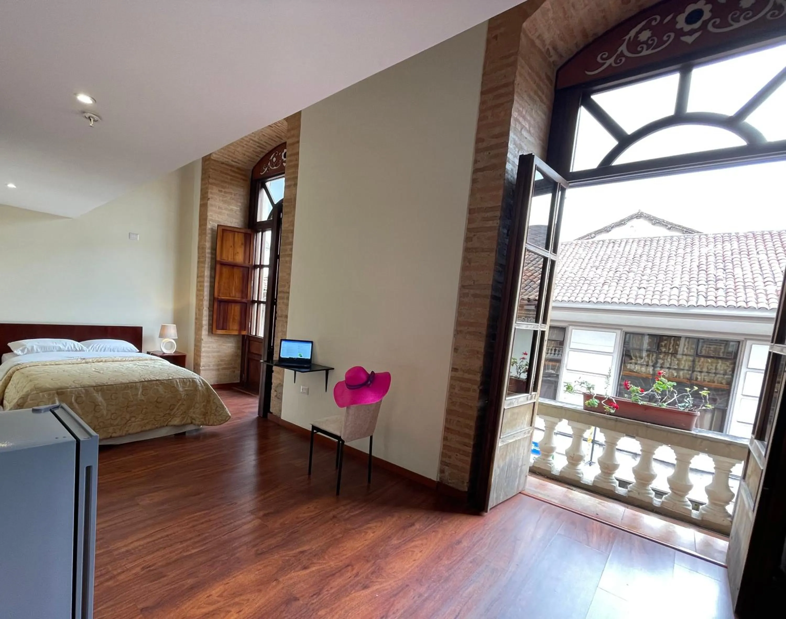 Photo of the whole room, Bed in Floré Hotel Boutique Cuenca