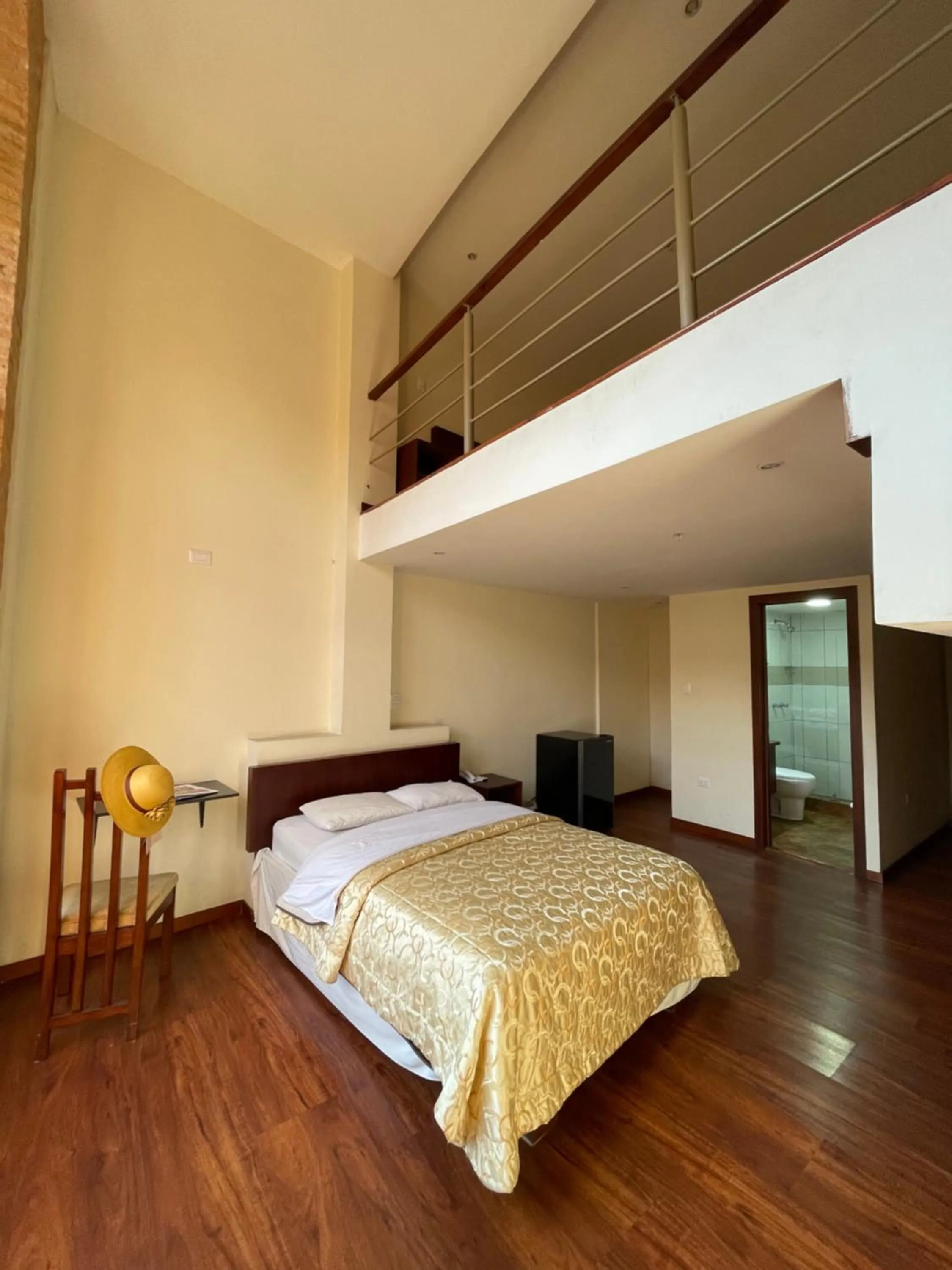 Photo of the whole room, Bed in Floré Hotel Boutique Cuenca